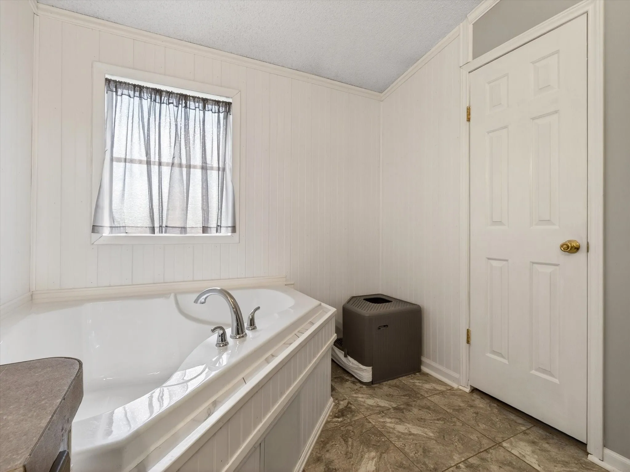 Brand new bathtub in primary bathroom