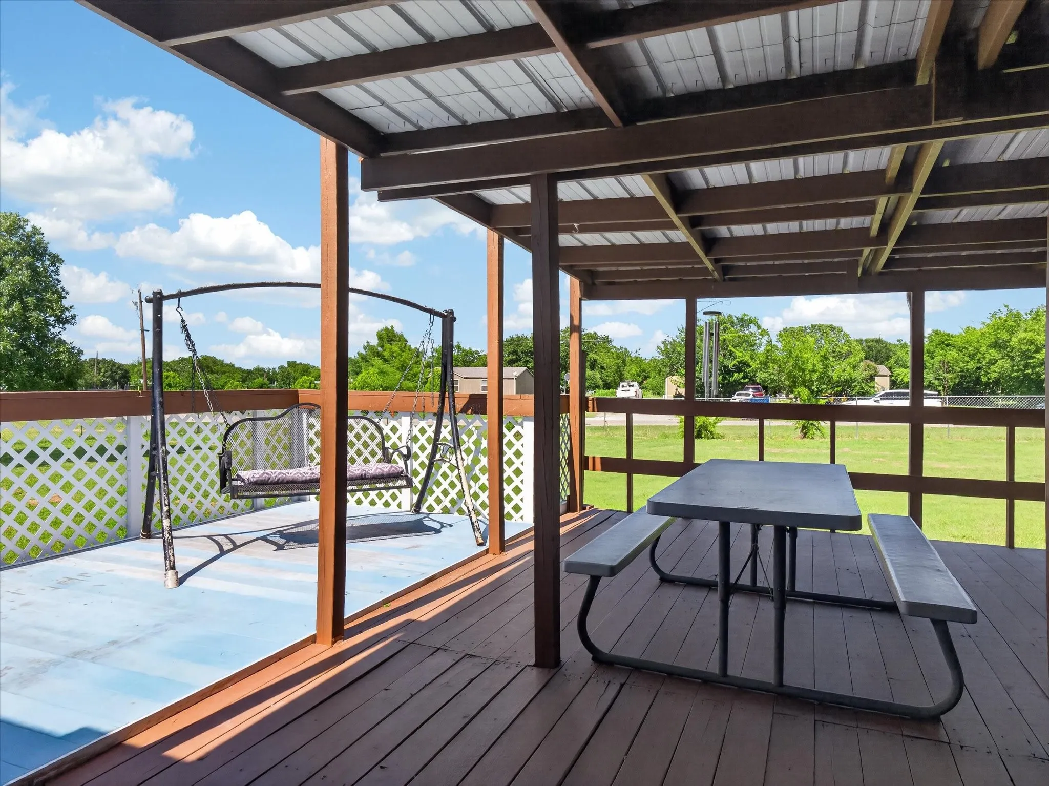 Extended front deck wraps around to back deck