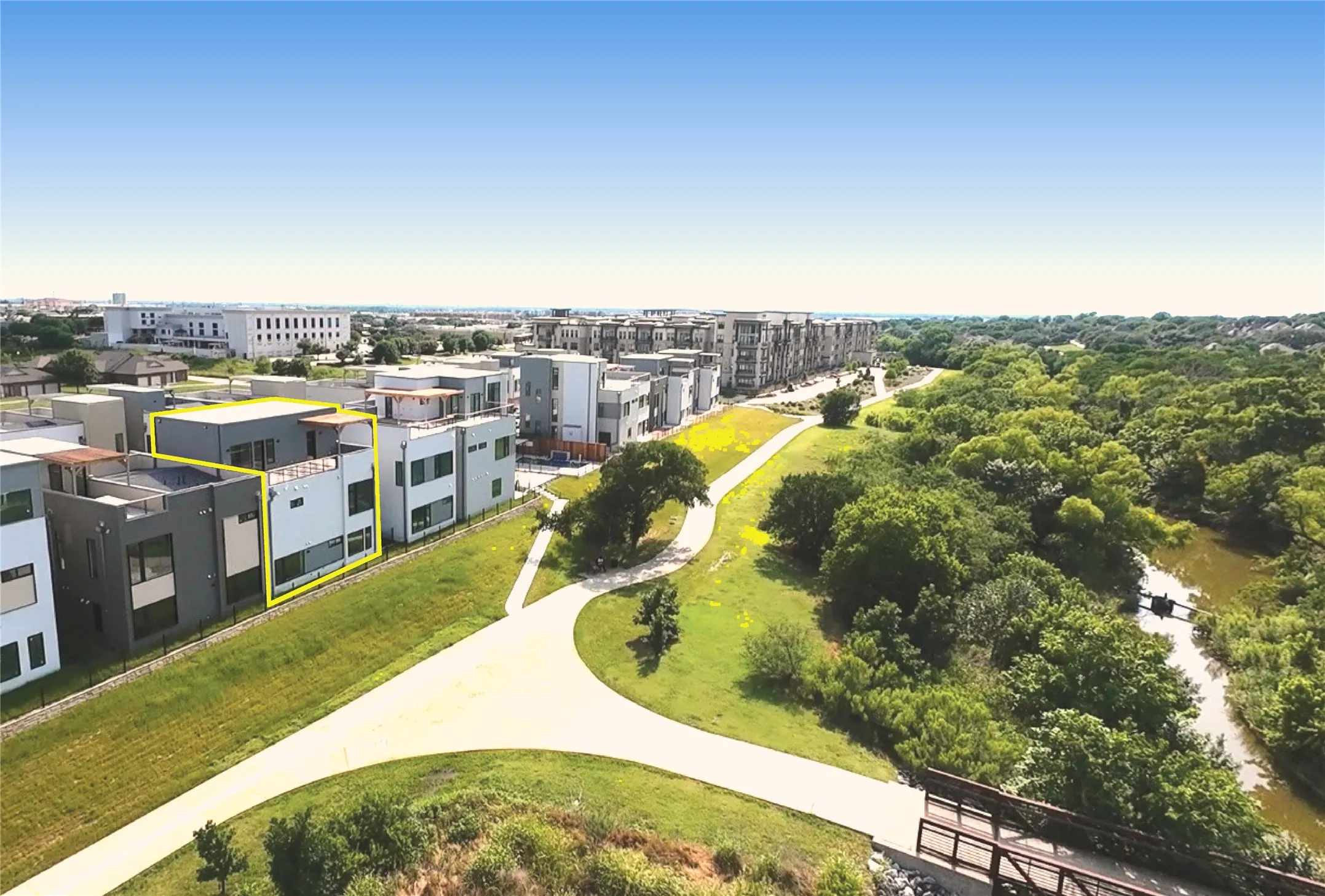 Contemporary multistory residence featuring elevator, rooftop deck, and fabulous views. Highlighted unit is #128 which sits on the Blue Trail (7 mile running / biking / walking trail).   Boutique high-end community in a fabulous location.