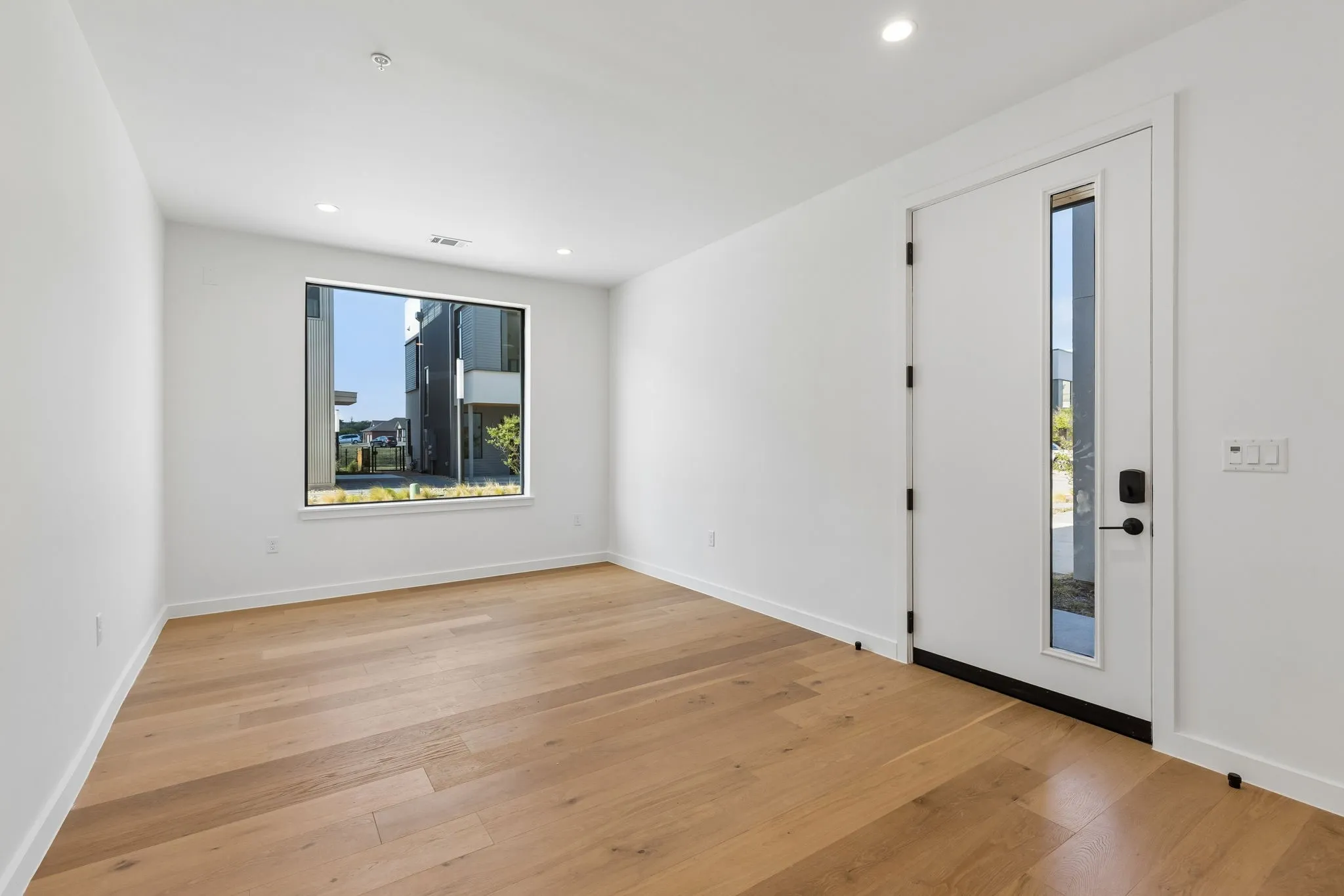 Entry room is 17x10 and can be a living room, office, flex space.  Elevator is a few steps away.