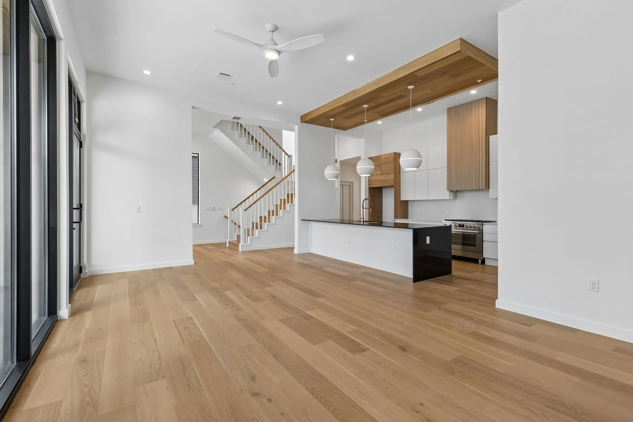 Spacious living room.  Dining room is tucked behind the wall.