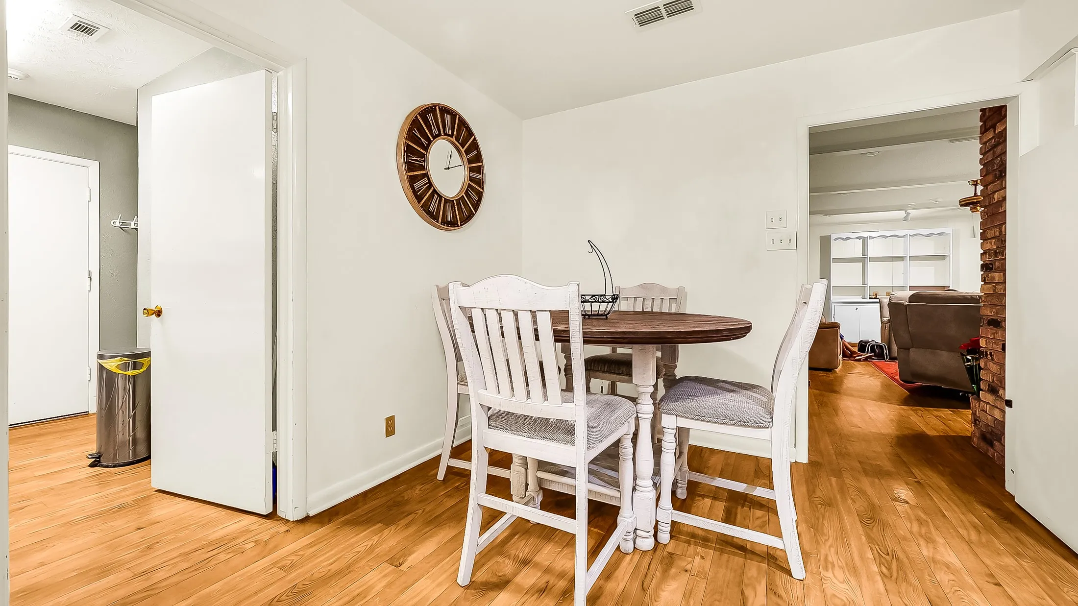 Dining area with wood-finish flooring