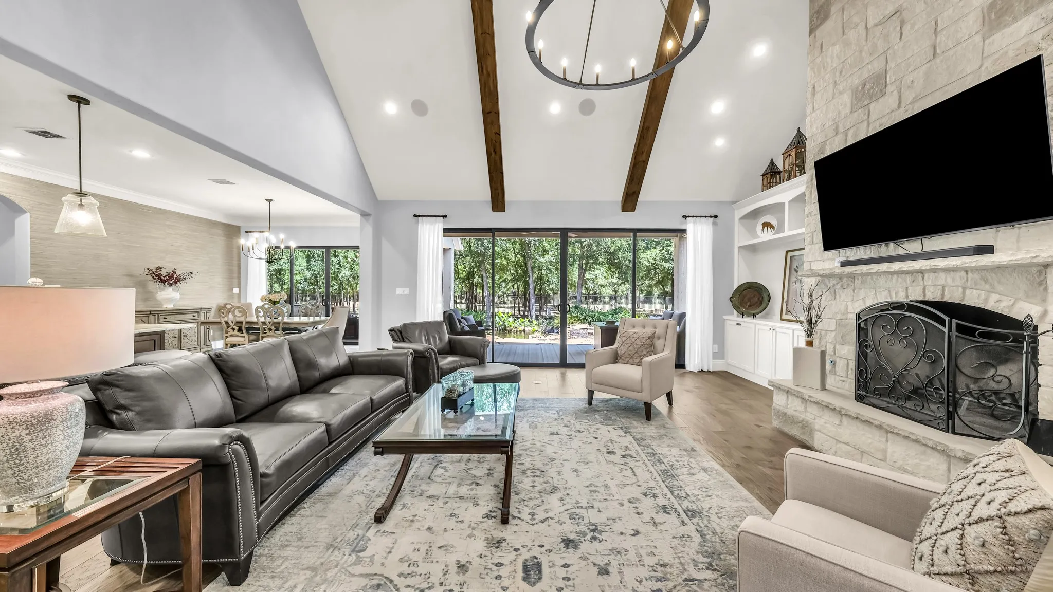 From the front hallway, you have this bright living area and a beautifully framed sliding glass door to the backyard. So much to take in.