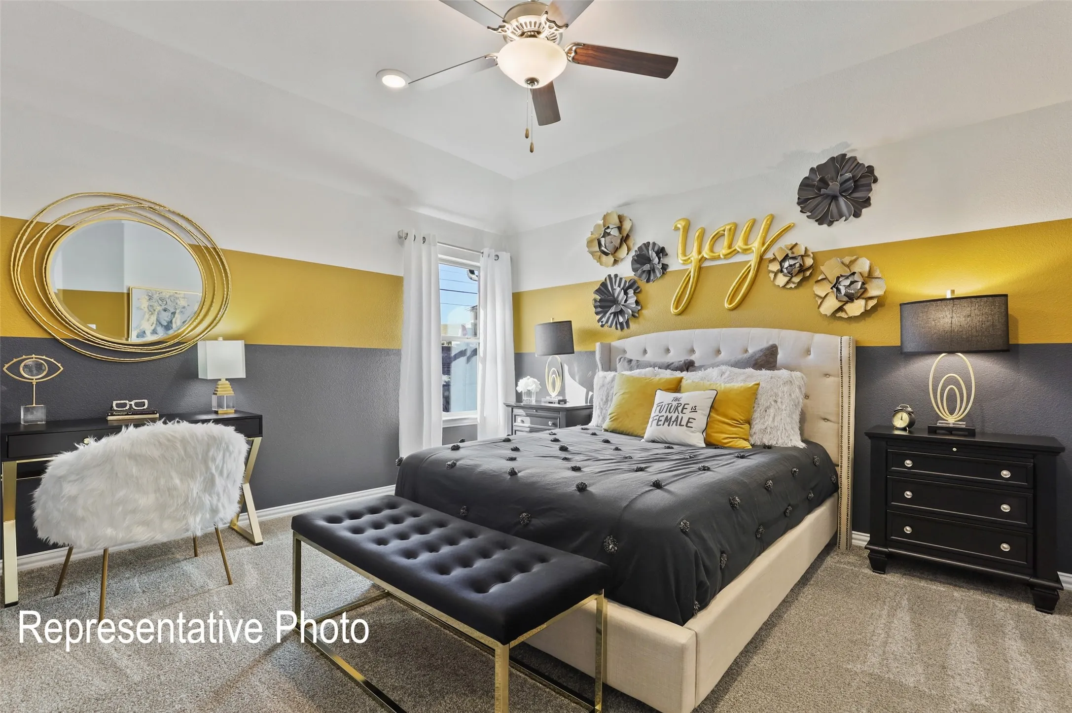 Bedroom featuring a tray ceiling with a ceiling fan, a window with vertical blinds, and neutral carpeting