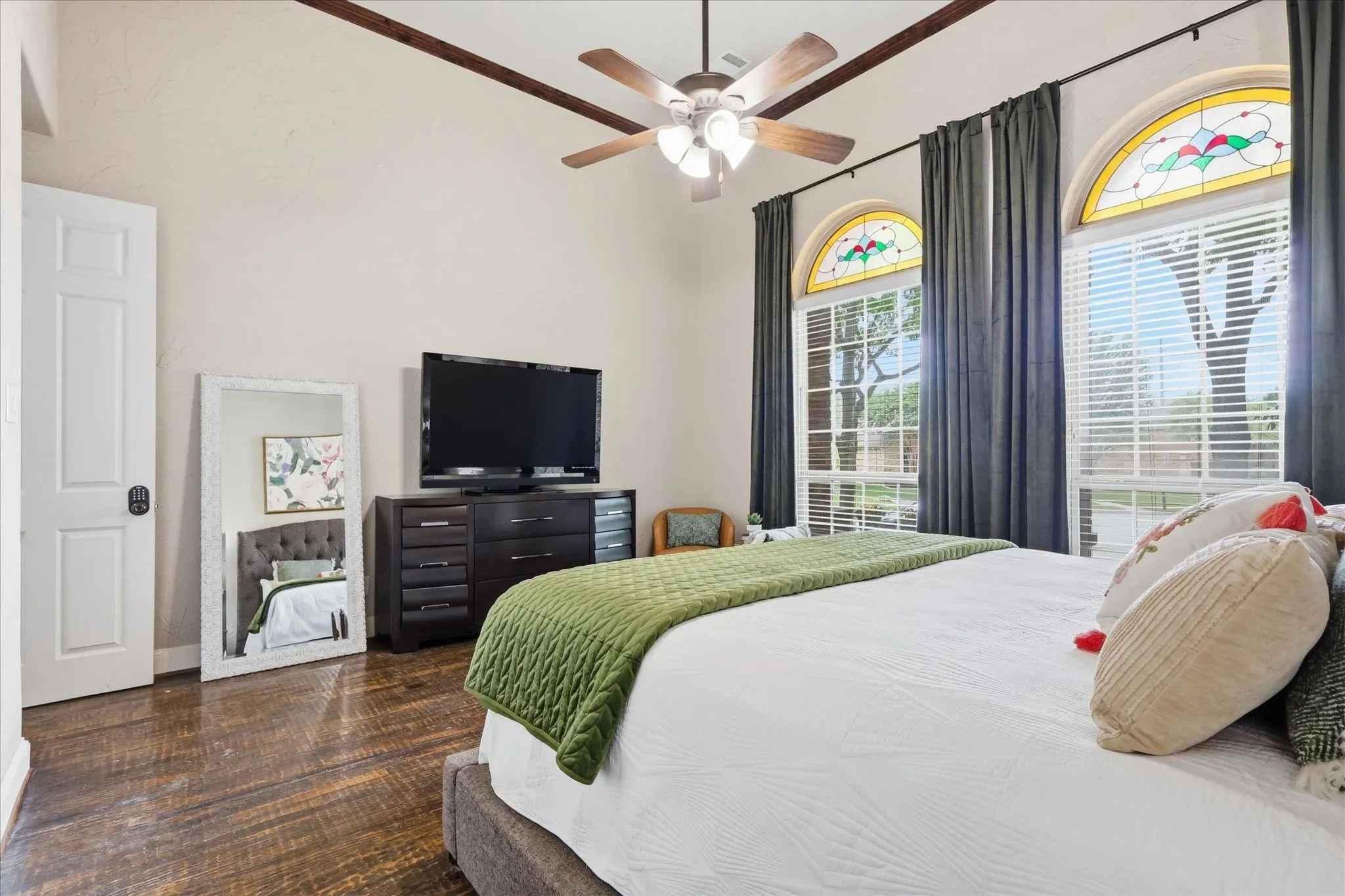 2253 Big Valley Circle, Allen, TX 75013 - Primary Bedroom - primary bedroom with vaulted ceiling with exposed wood beams and a ceiling fan