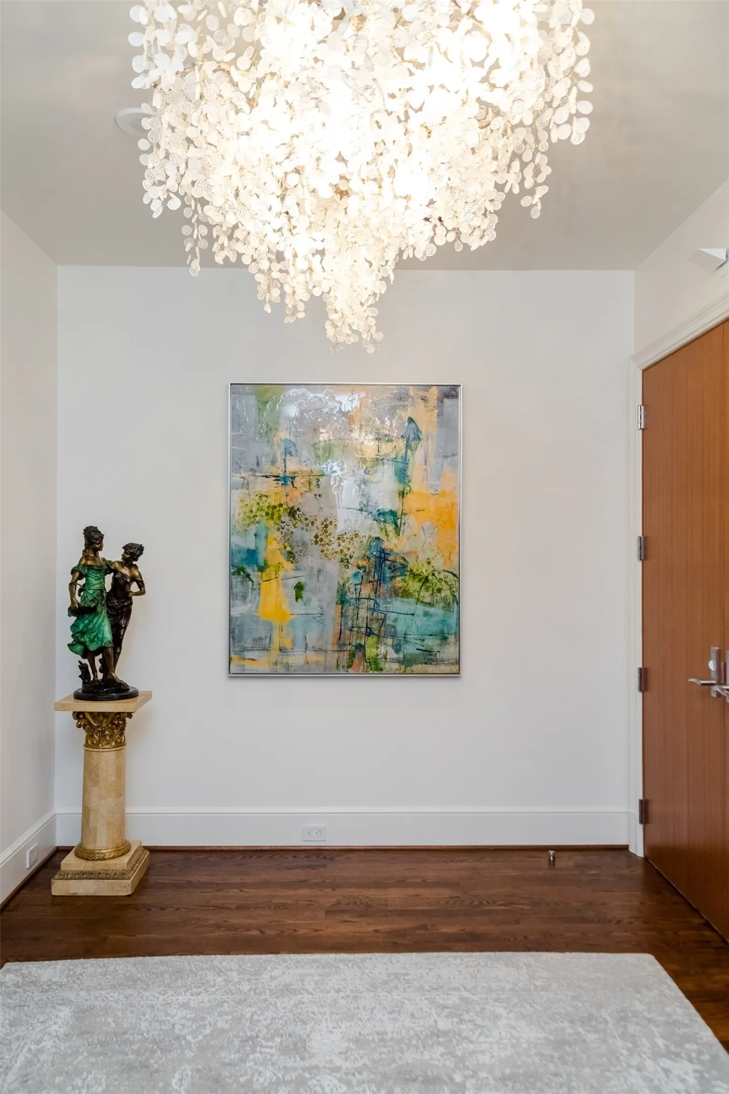 Dramatic Foyer With Stunning John-Richard Chandelier.