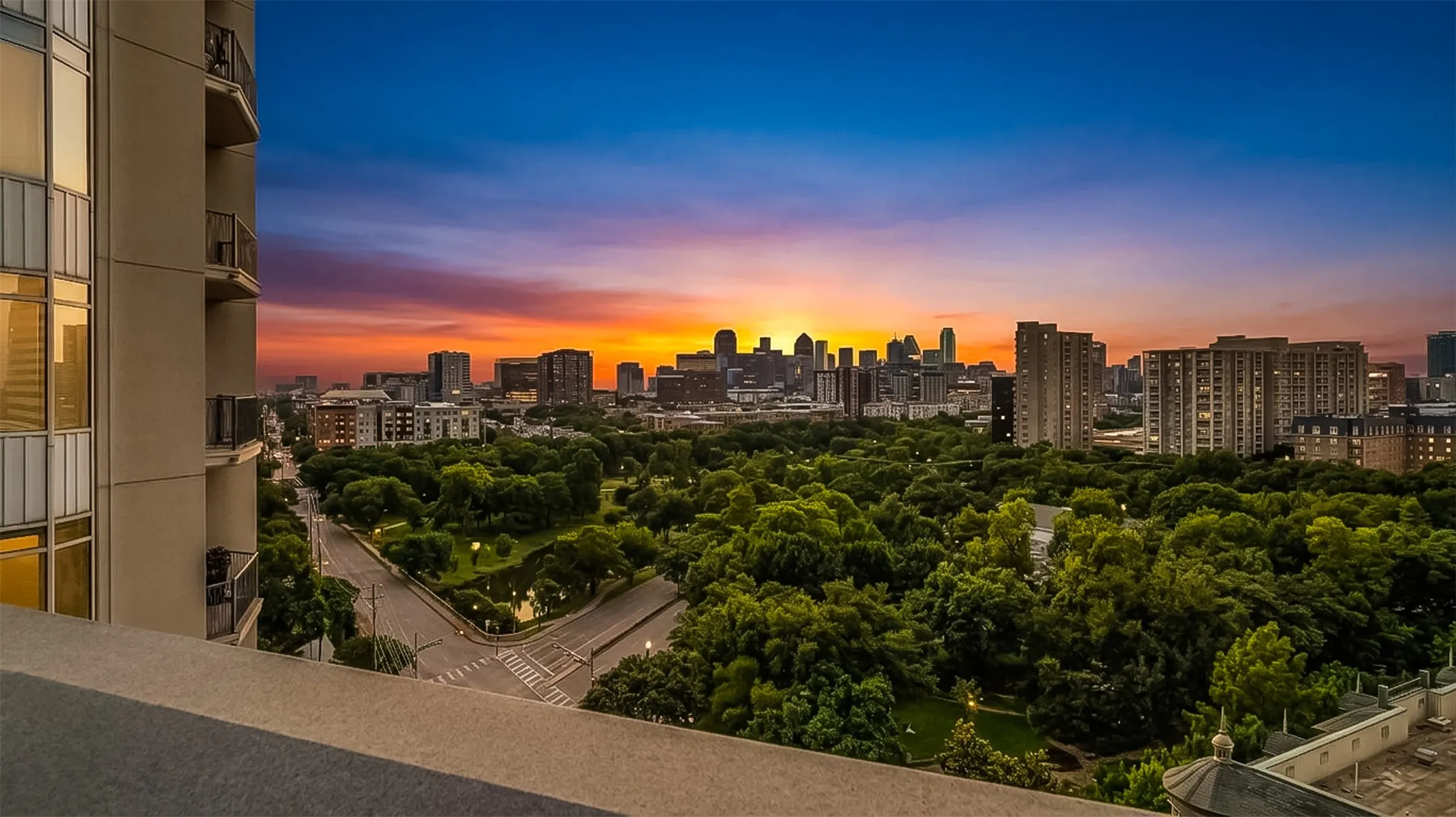 Sunset View Over Turtle Creek Park To Downtown.