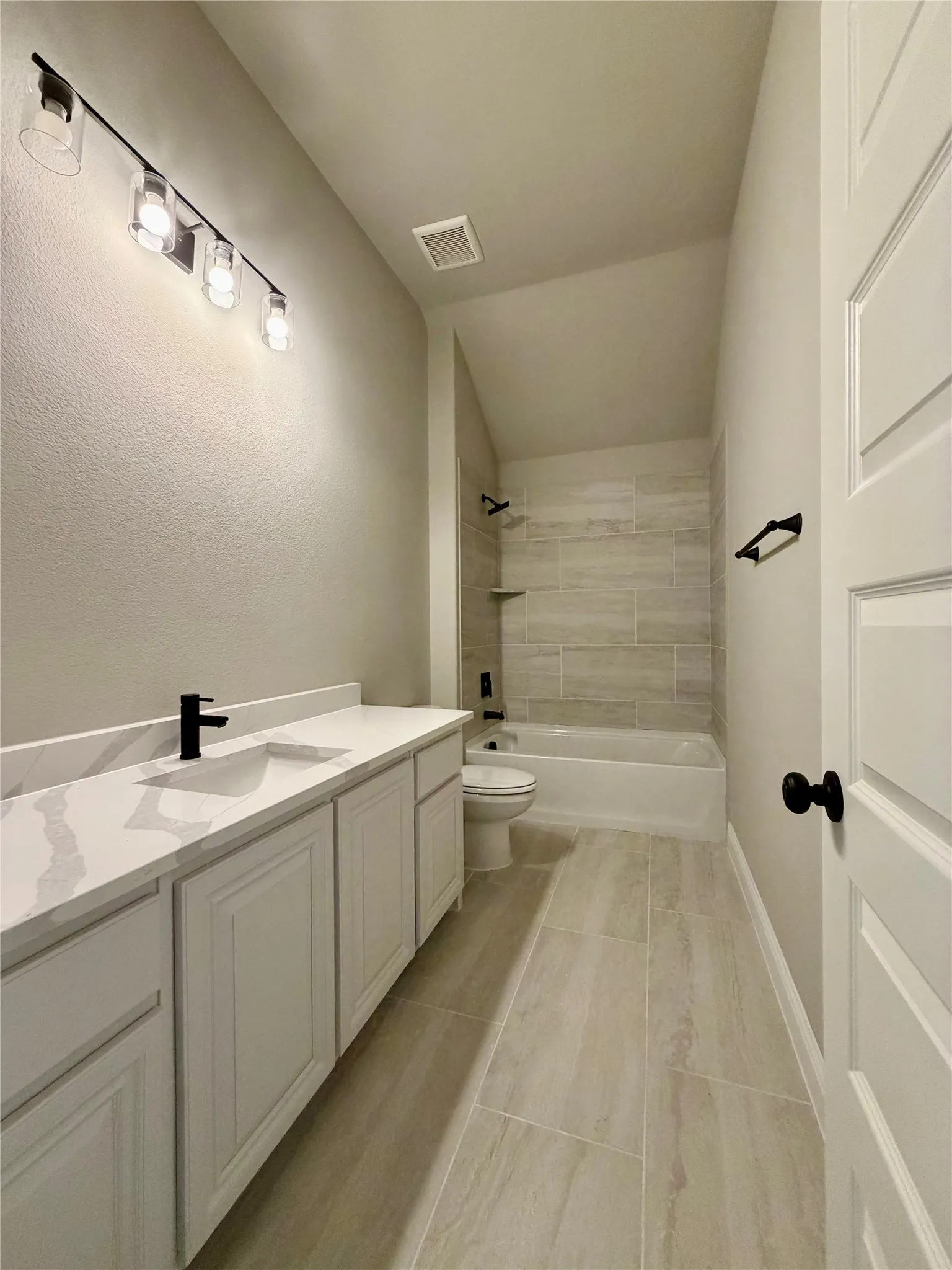 Beth 3 upstairs with large quartz vanity & 12x4 tile (mirror not installed yet)
