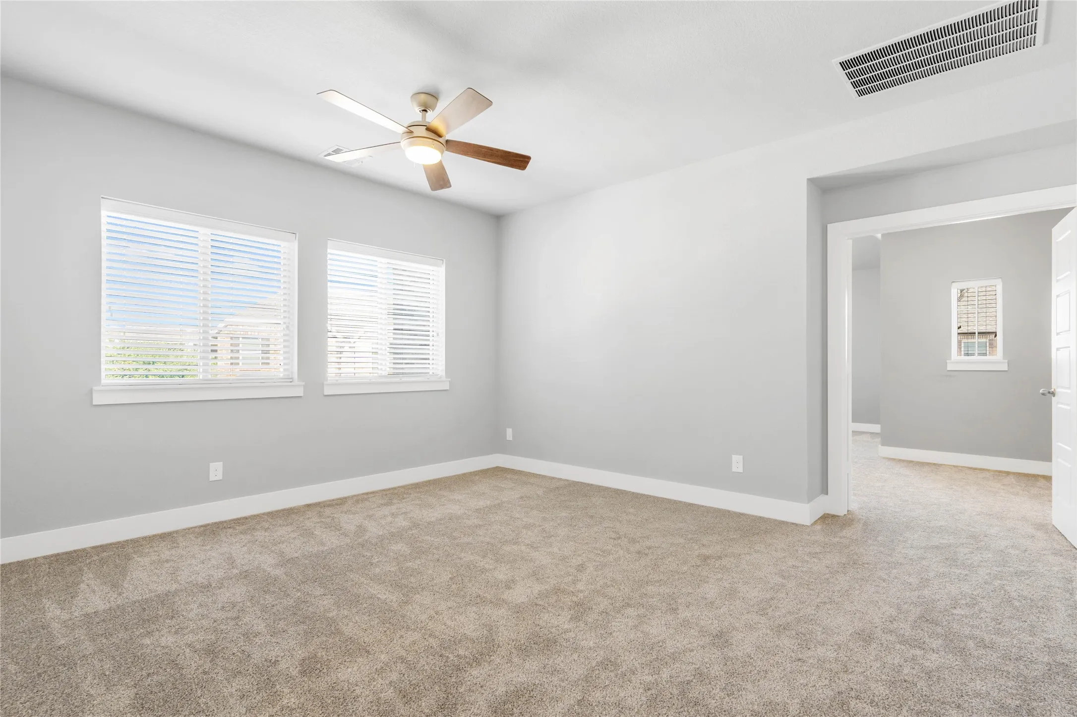 Living Area 3, doors leading to Master Suite