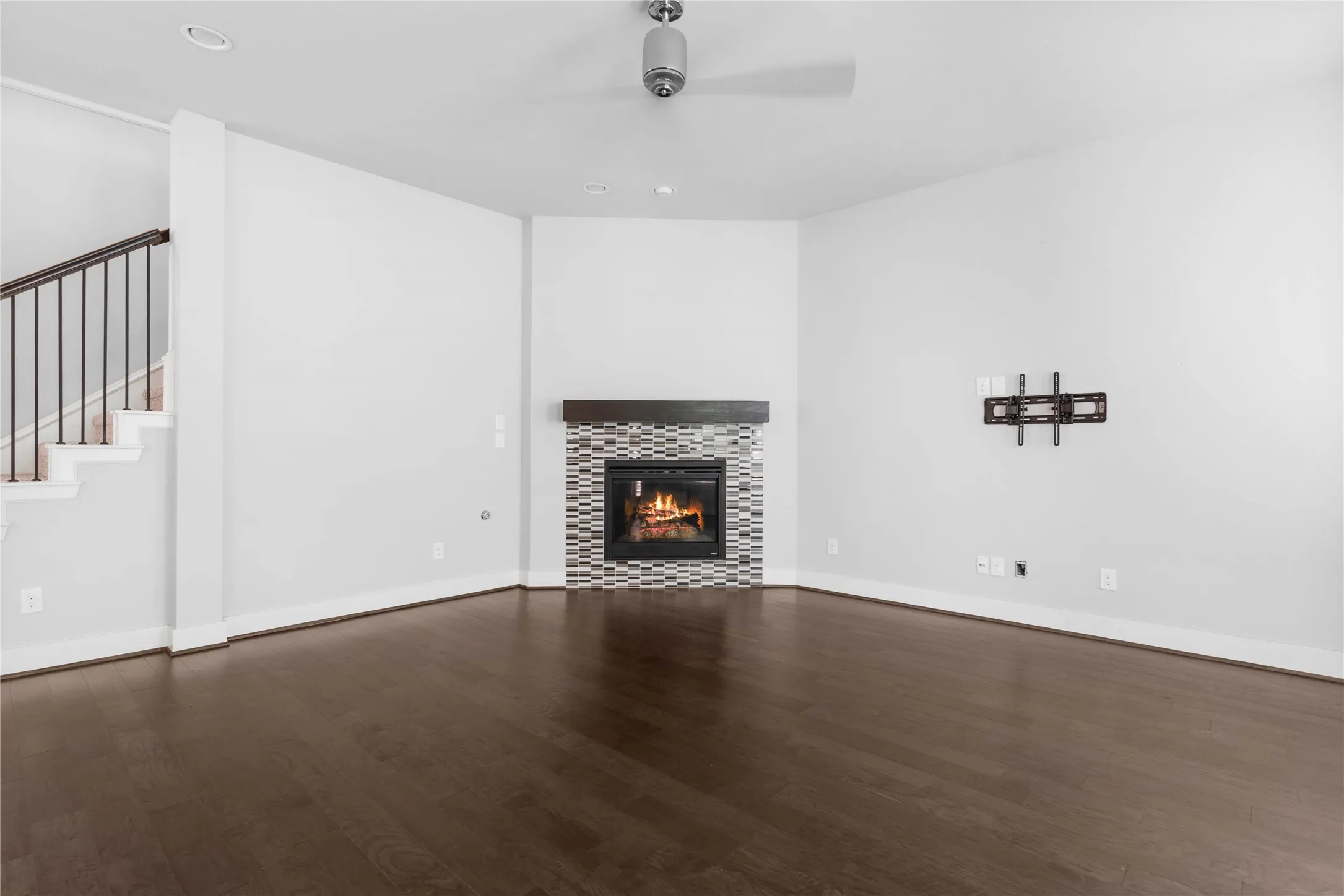 Gas Fireplace and TV Mount on Wall in Den