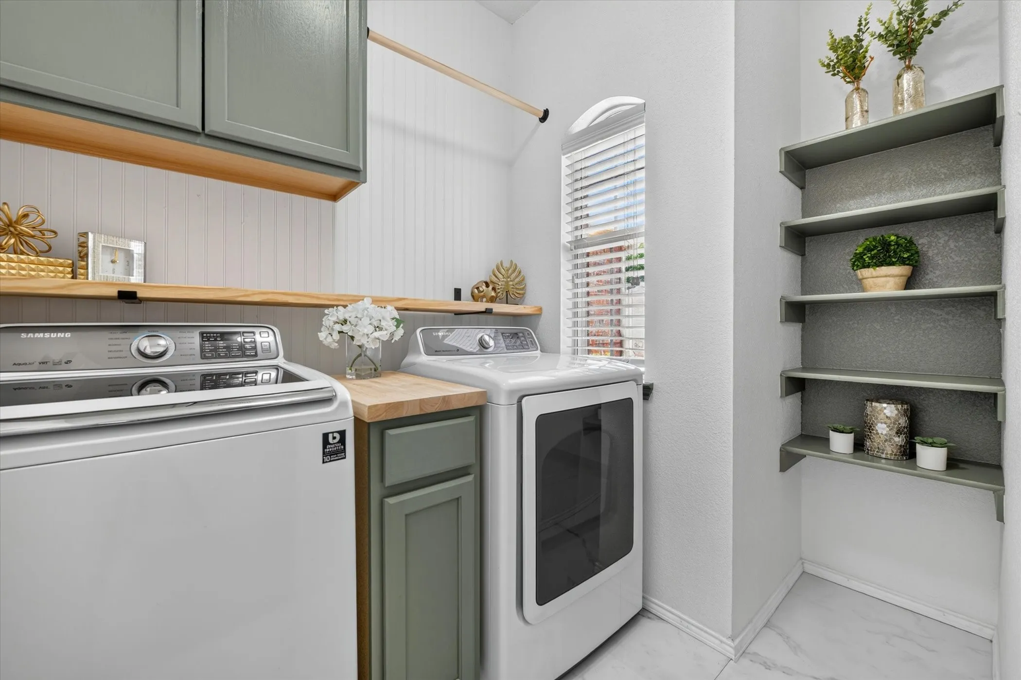 Recently Remodeled laundry room is super cute and functional