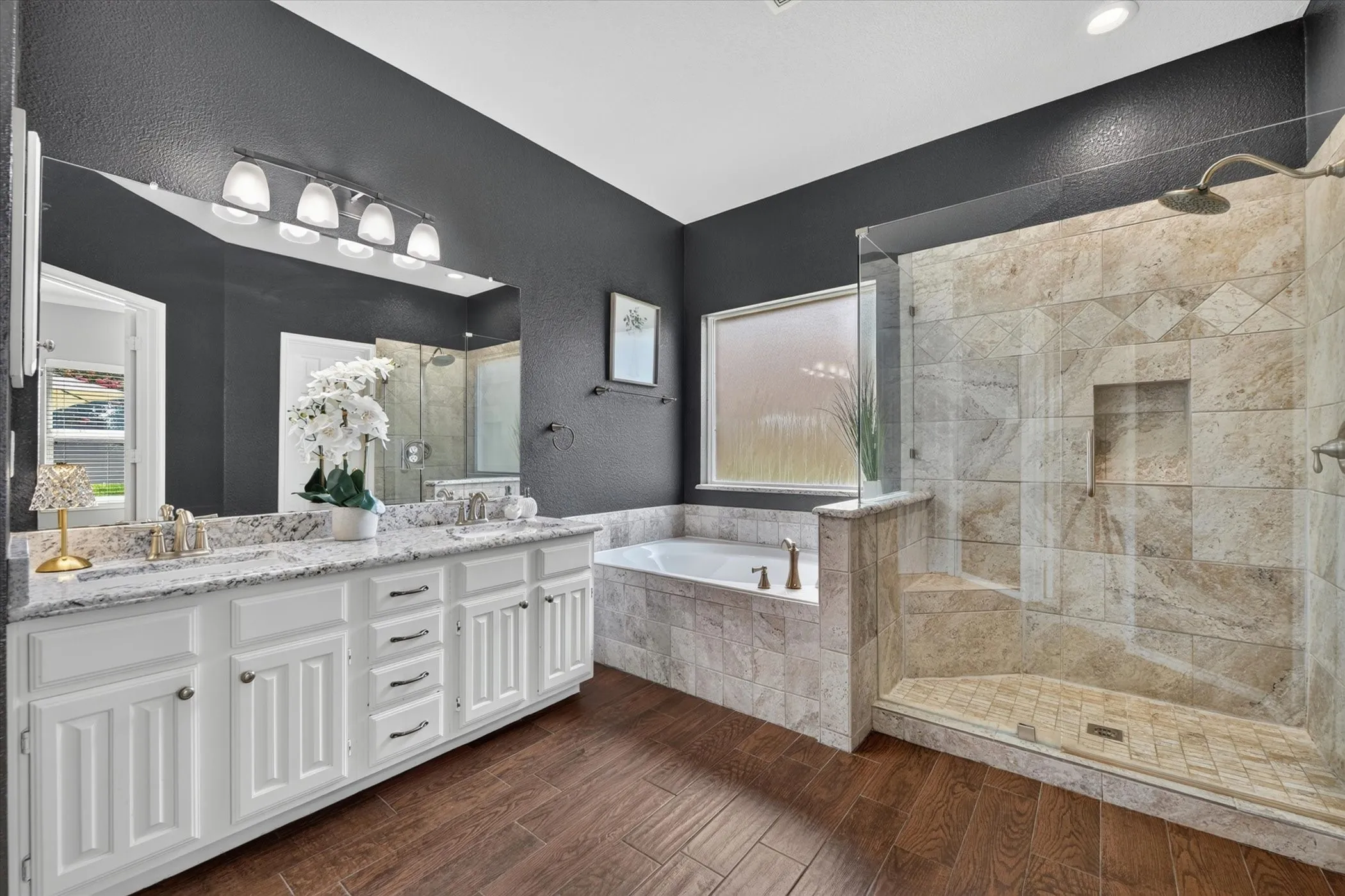 Updated primary bathroom is a retreat