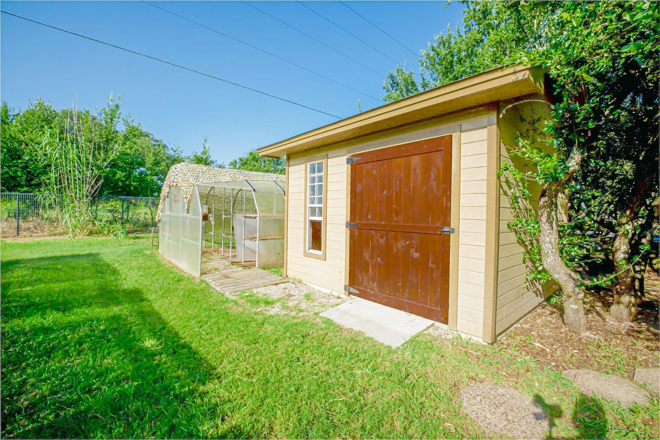Storage building & greenhouse.