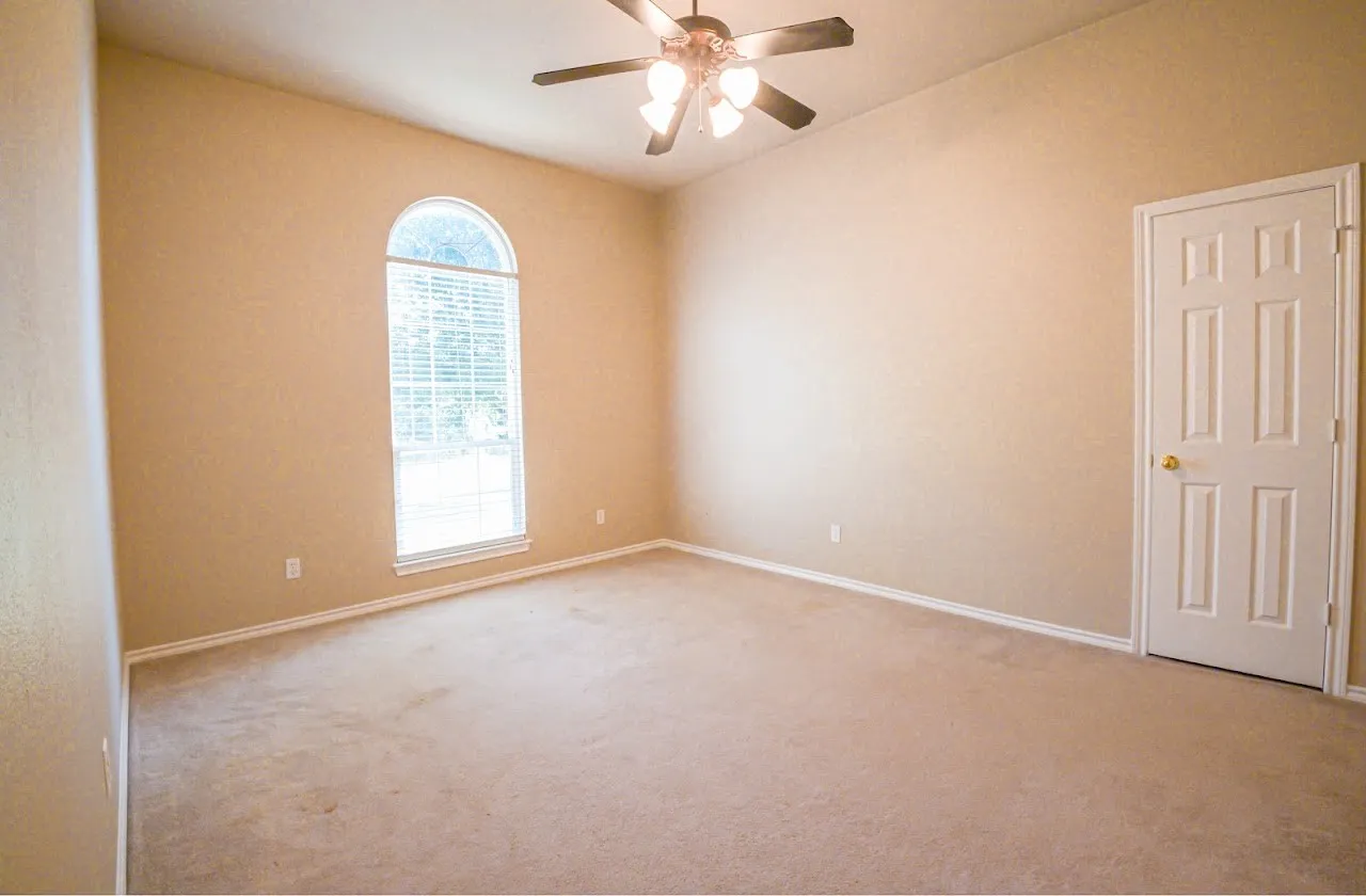 4th bedroom, this is the only room with carpet.