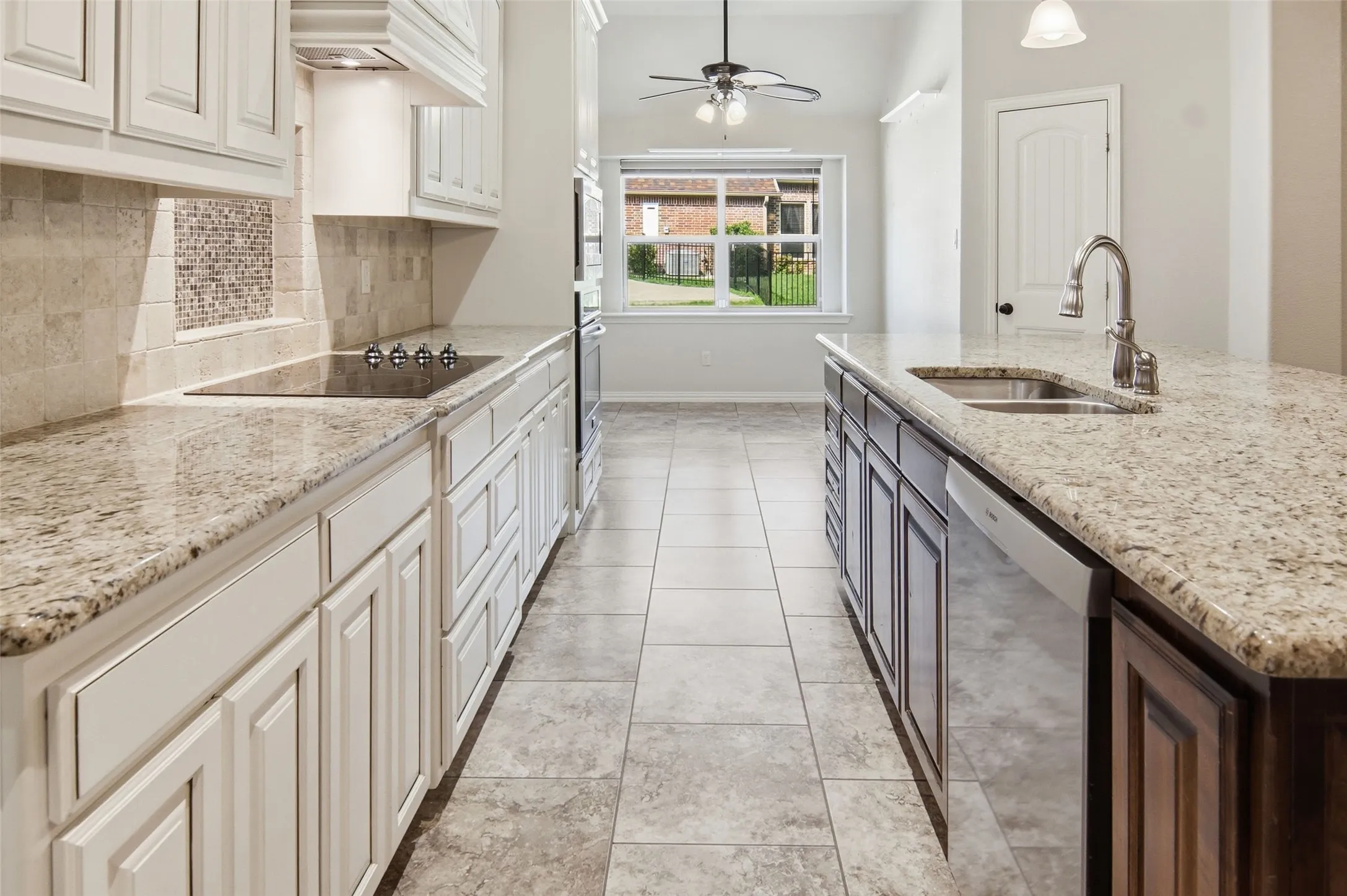 kitchen view of the breakfast nook and the walk-in pantry
