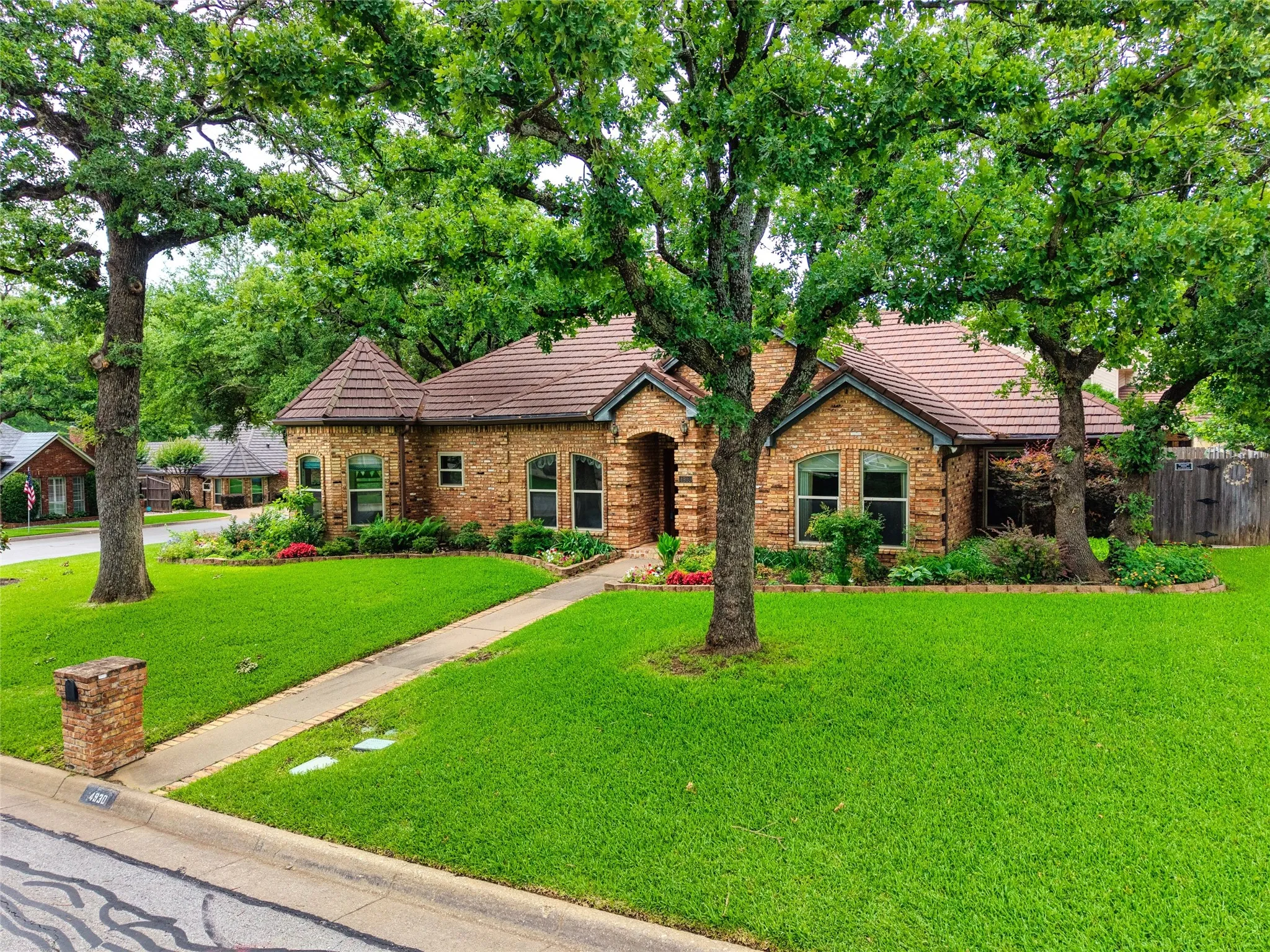 Stunning home on large corner treed lot!