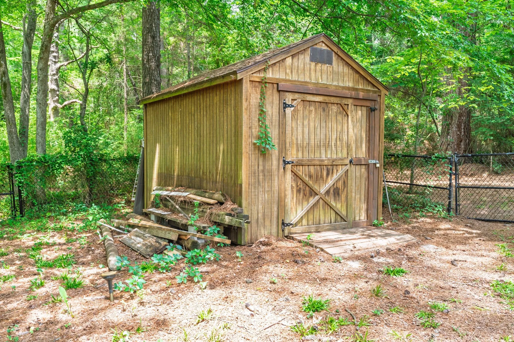 Shed on the property for outdoor tools/mower storage