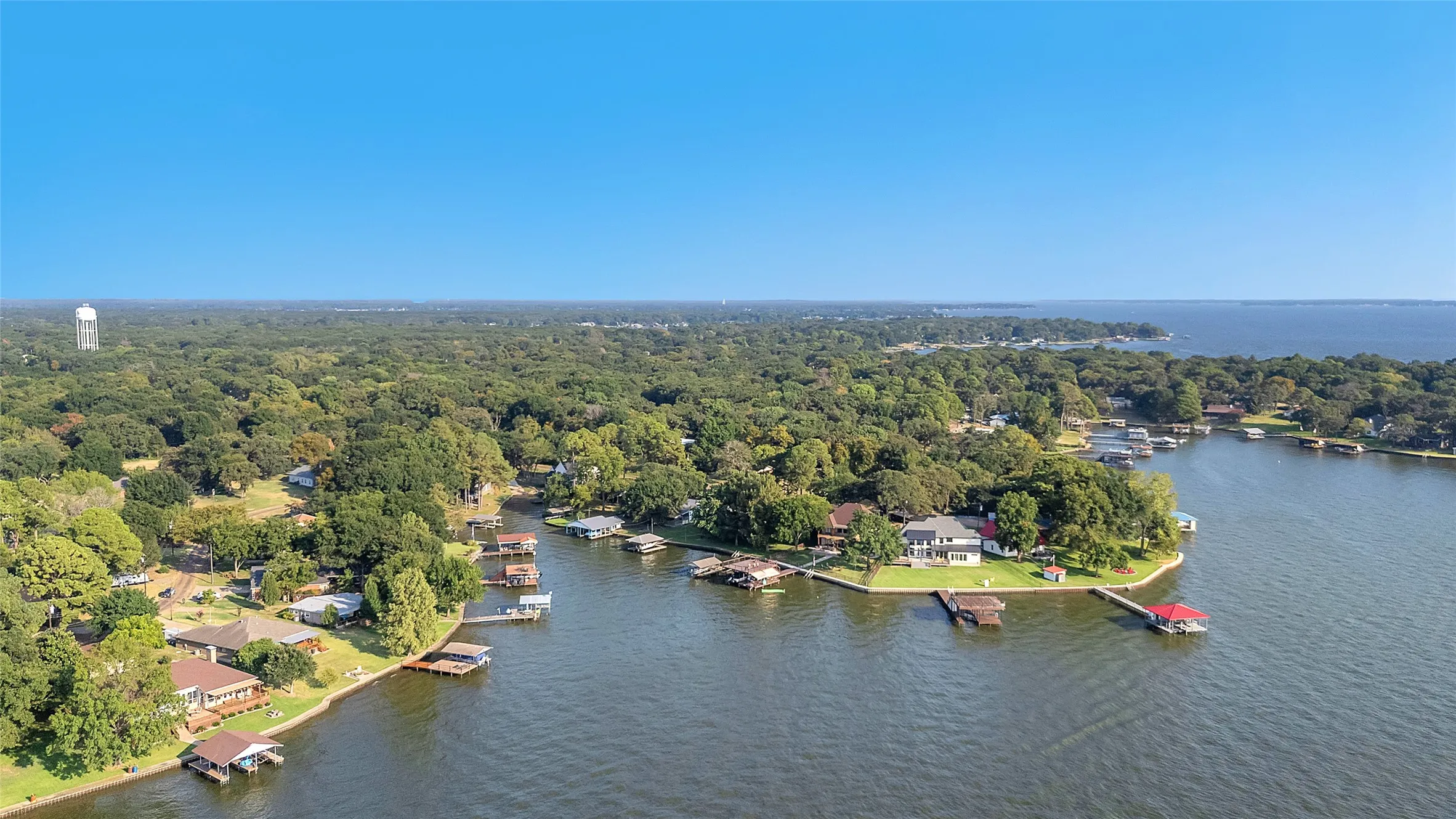 Birds eye view of property on protected open water
