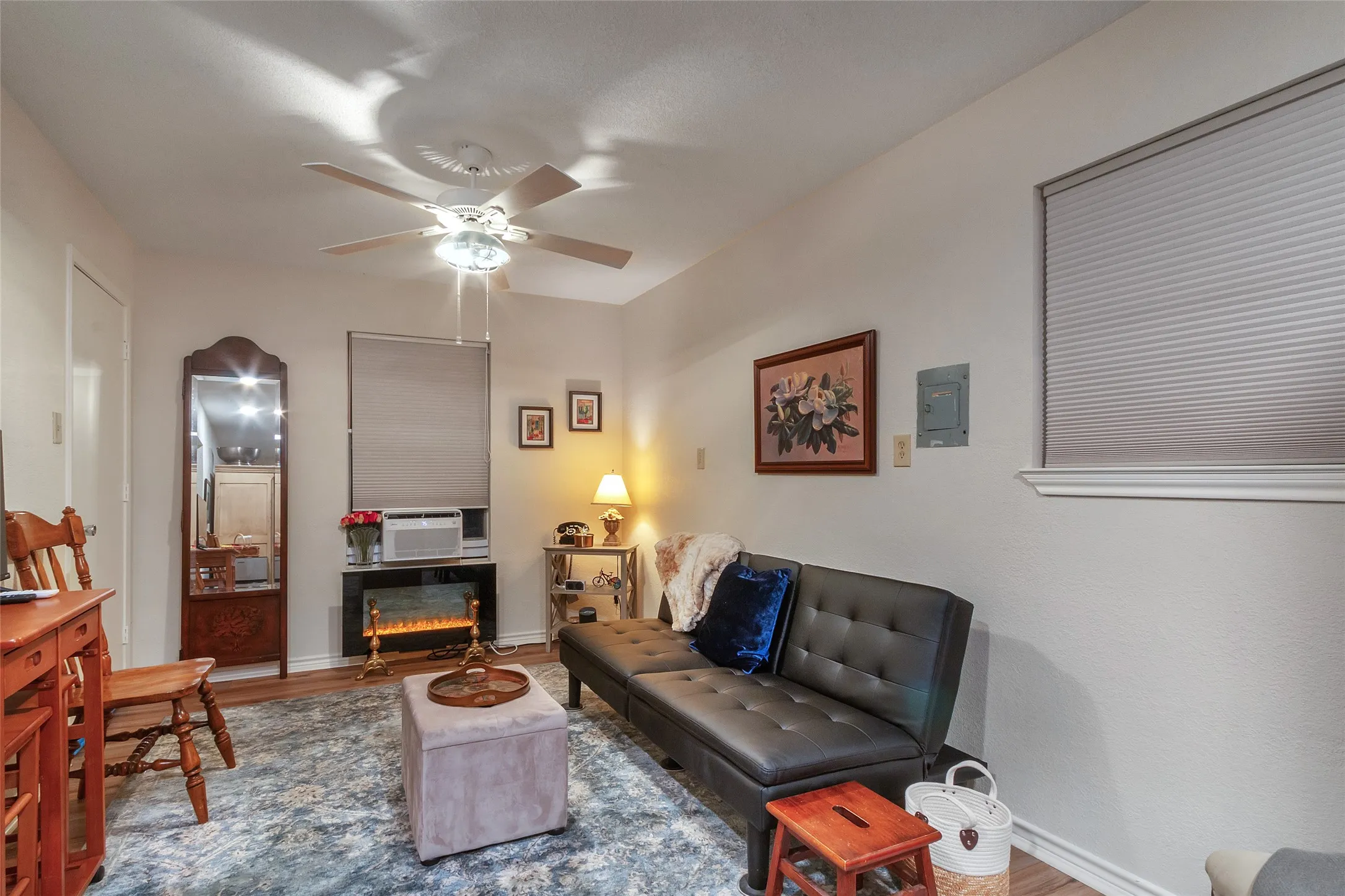 Garage Guest Quarters or Office has half-bath, window ac, electric FP with heat and eating area with microwave