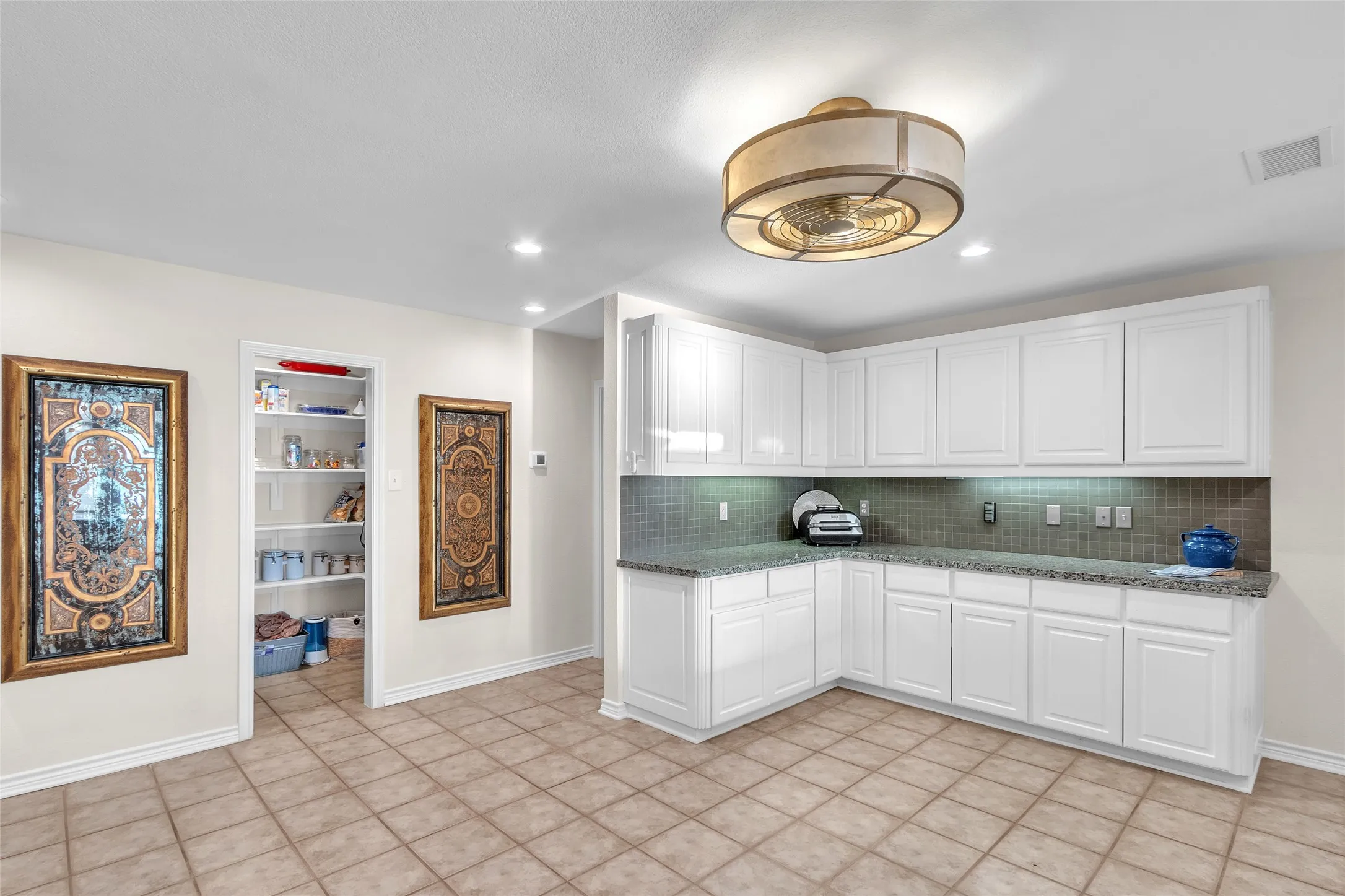 Extravagant gourmet kitchen has room for center island or dining with walk-in pantry