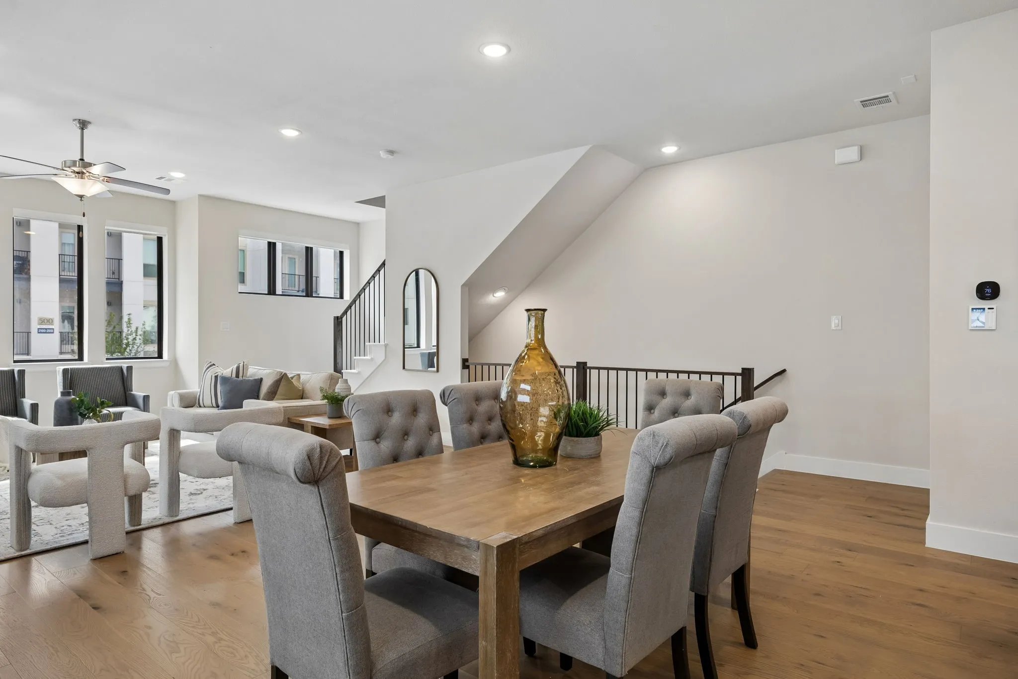 Open-Concept Entertaining
Positioned at the heart of the home, this spacious dining area keeps everyone connected while maintaining defined spaces for gathering and conversation.