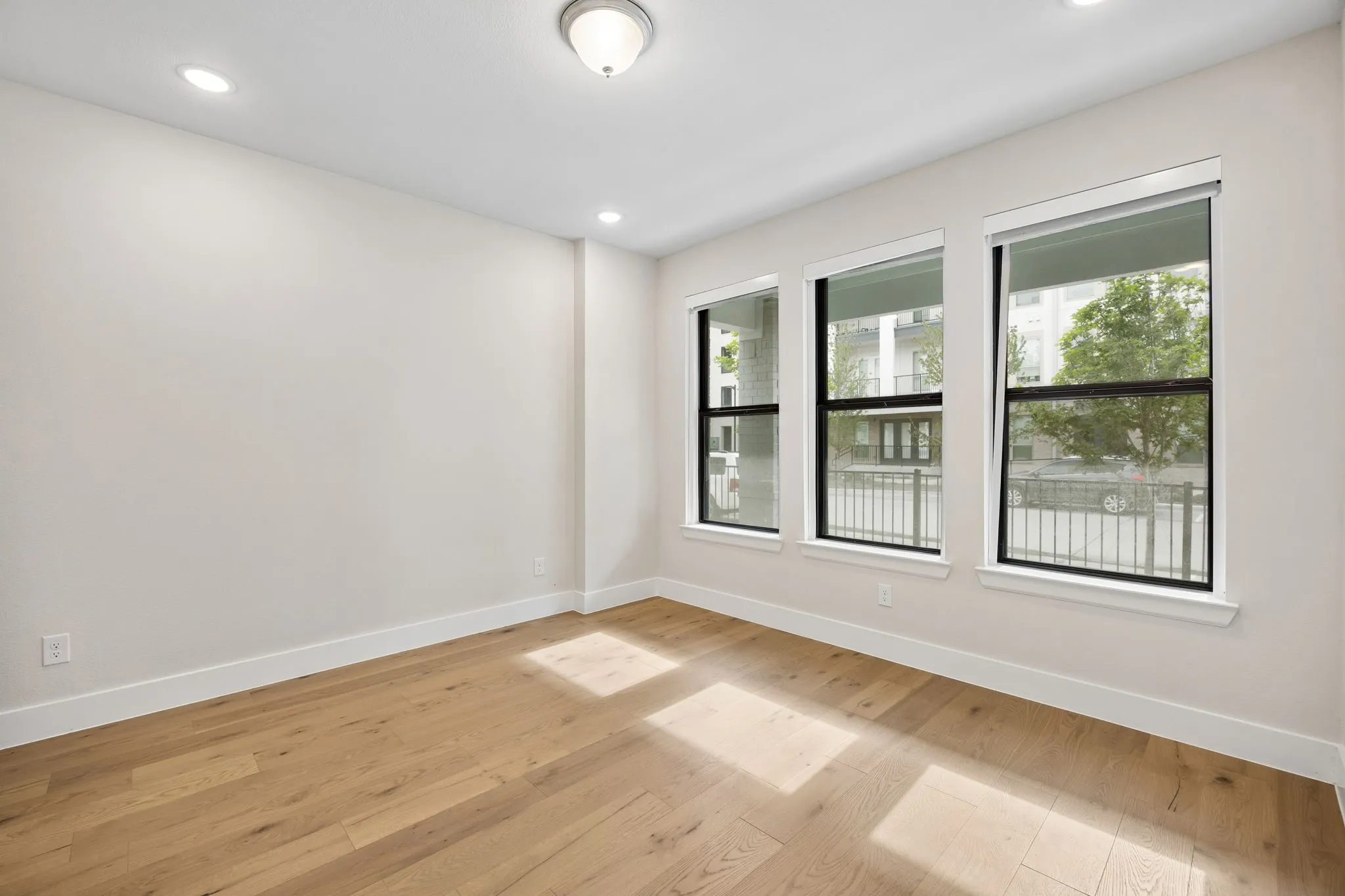 Flexible Main-Level Retreat
Located on the first floor, this versatile bedroom offers convenience for guests, a home office, workout room, or creative space.