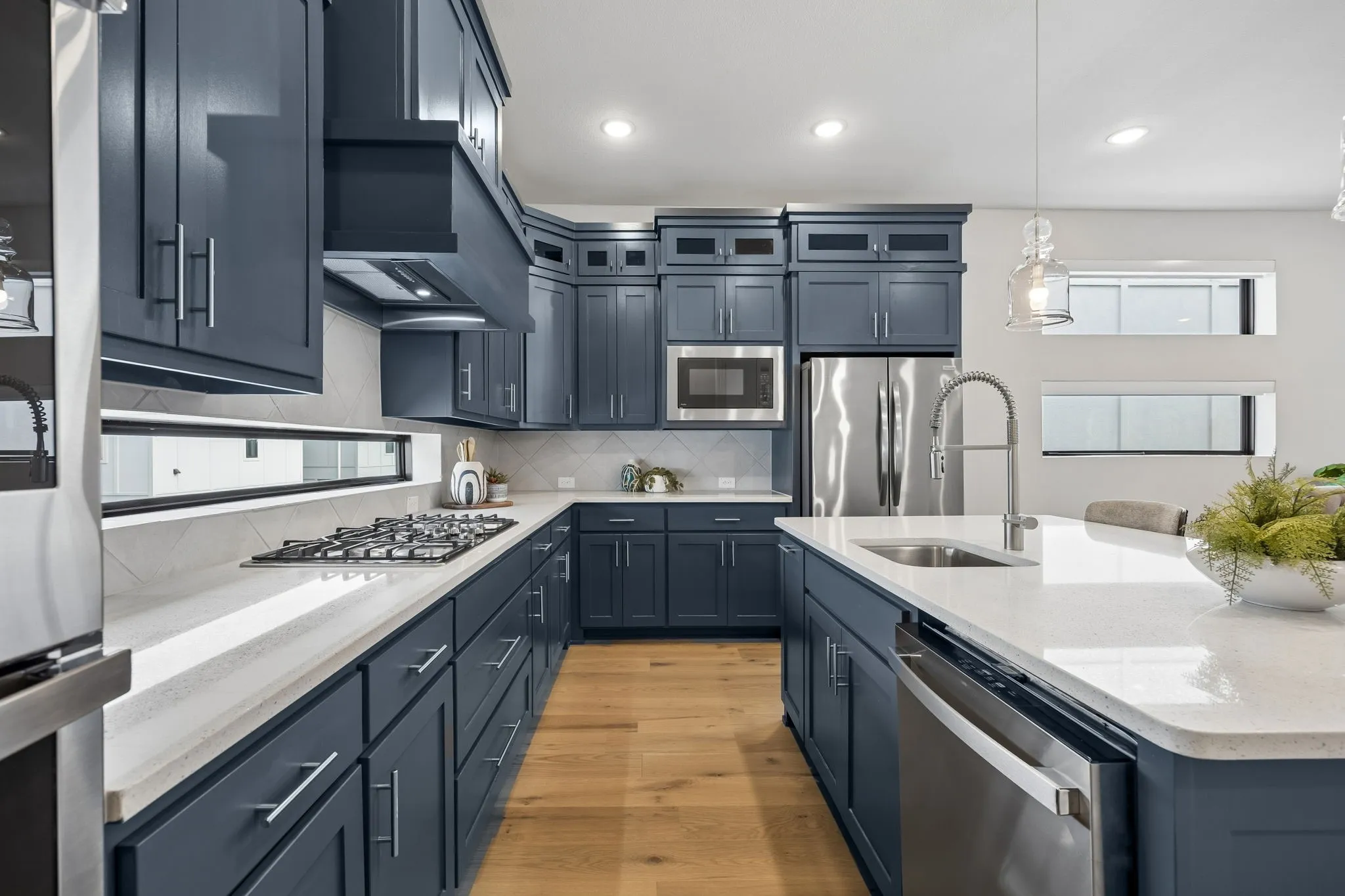 Thoughtful Design at Every Turn
Double ovens, a gas cooktop, extensive cabinetry, and generous counter space create an environment built for both daily living and hosting.