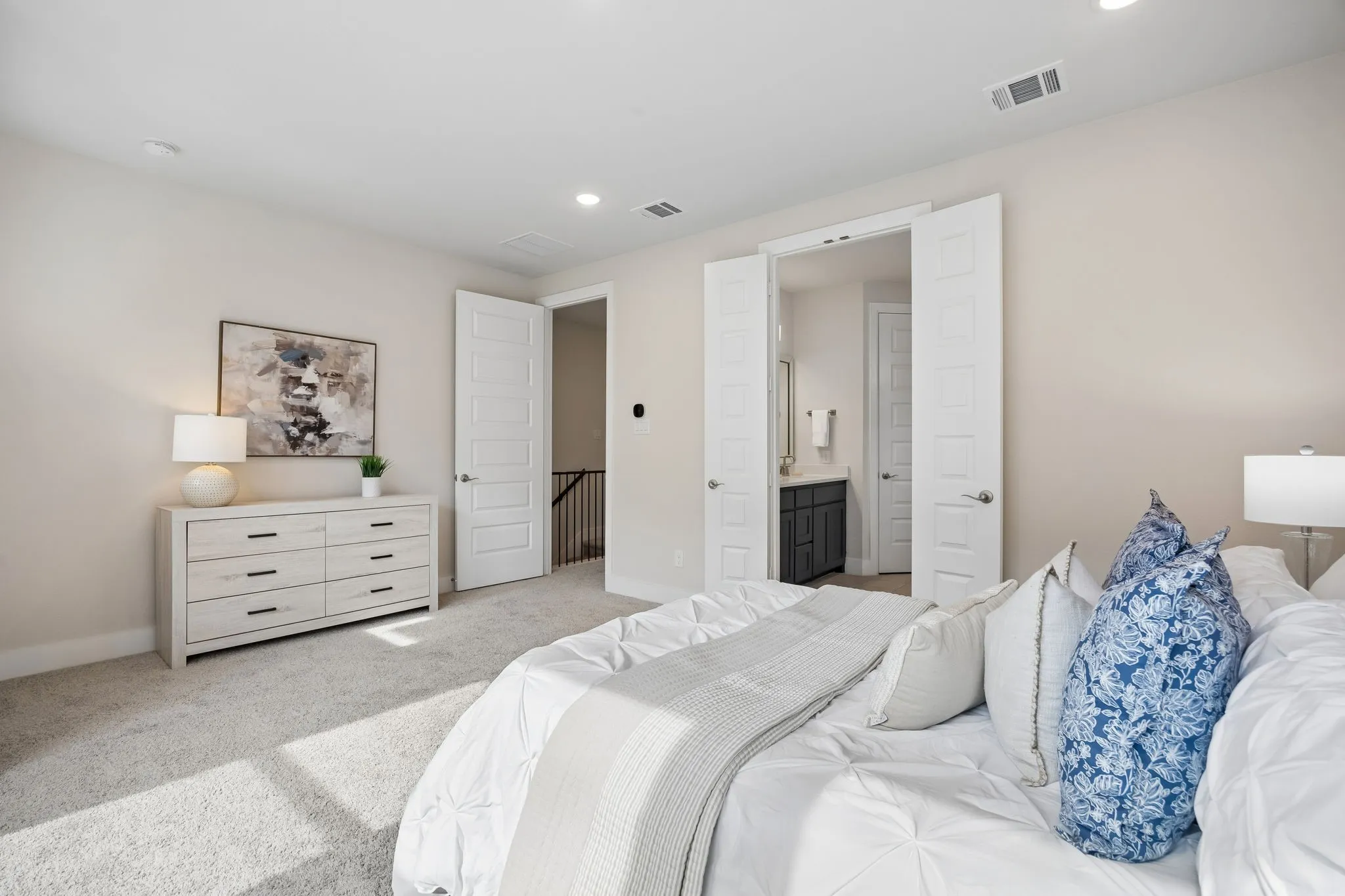 Light-Filled Primary Bedroom
Large windows invite sunlight throughout the day while the generous layout creates a comfortable and relaxing retreat.