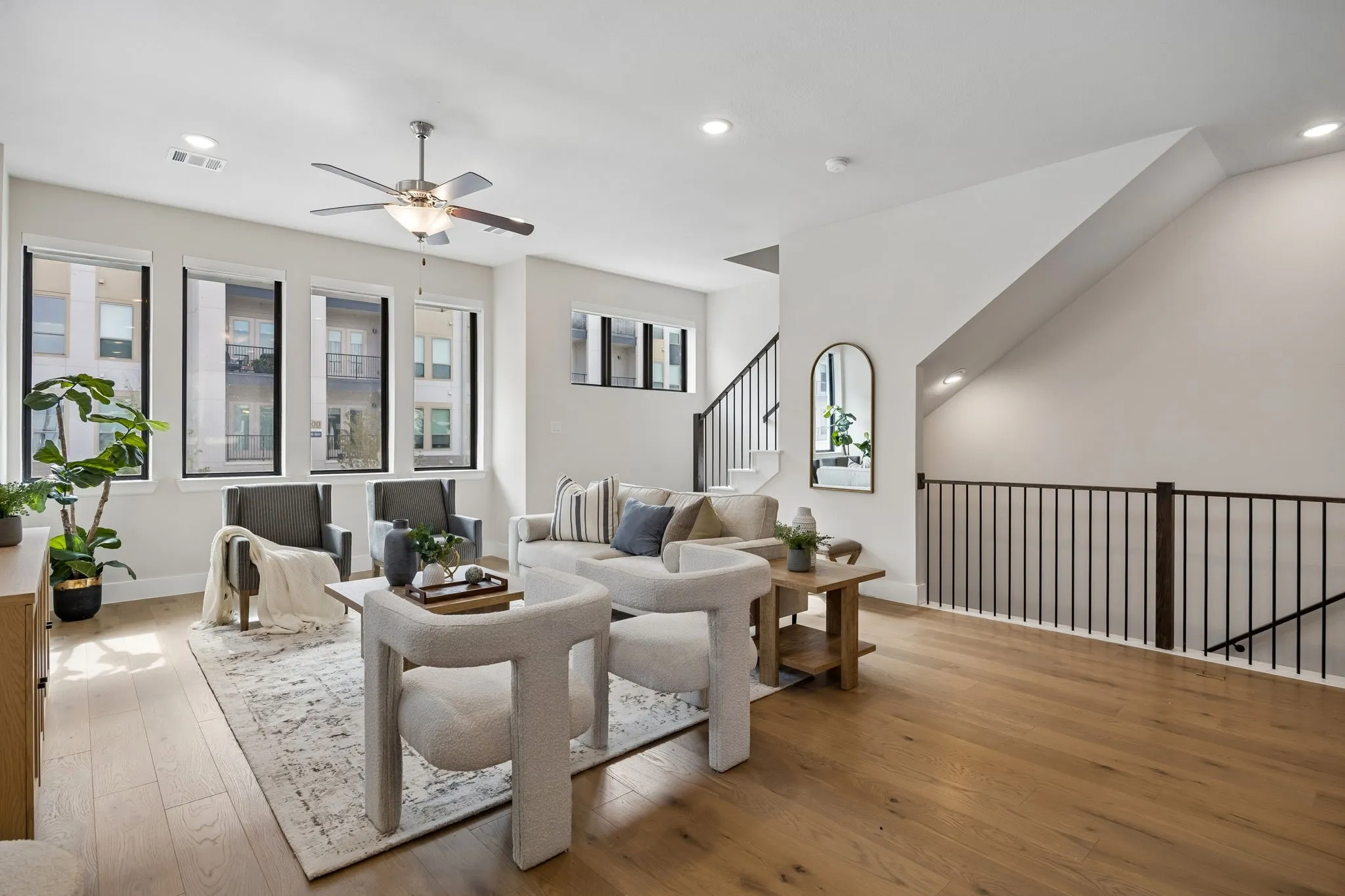 Bright, Open, and Inviting
Expansive windows fill the living area with natural light while the open layout offers flexibility for a variety of furniture arrangements.