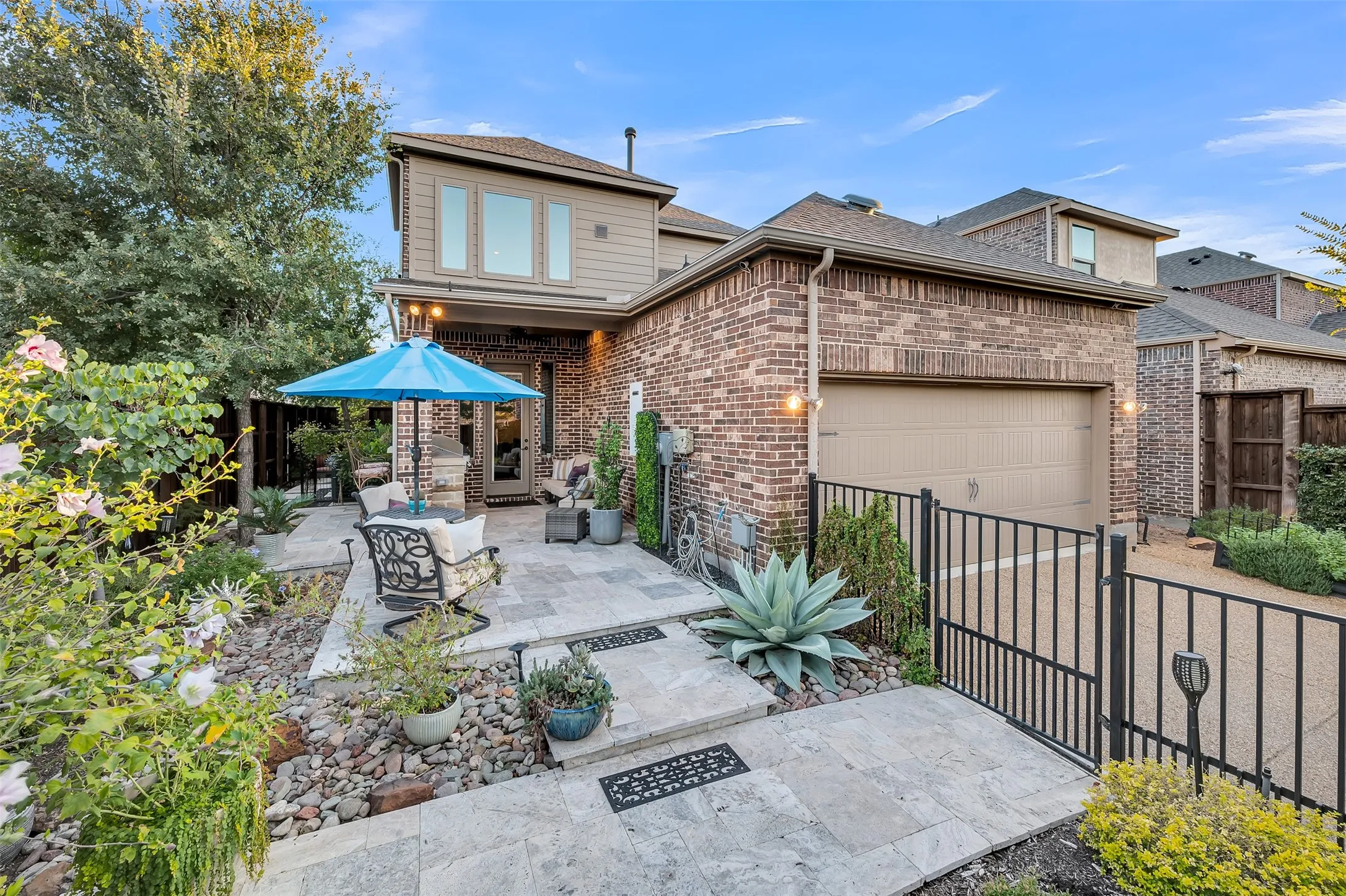 Backyard gated garage entrance, lovely built-in grill