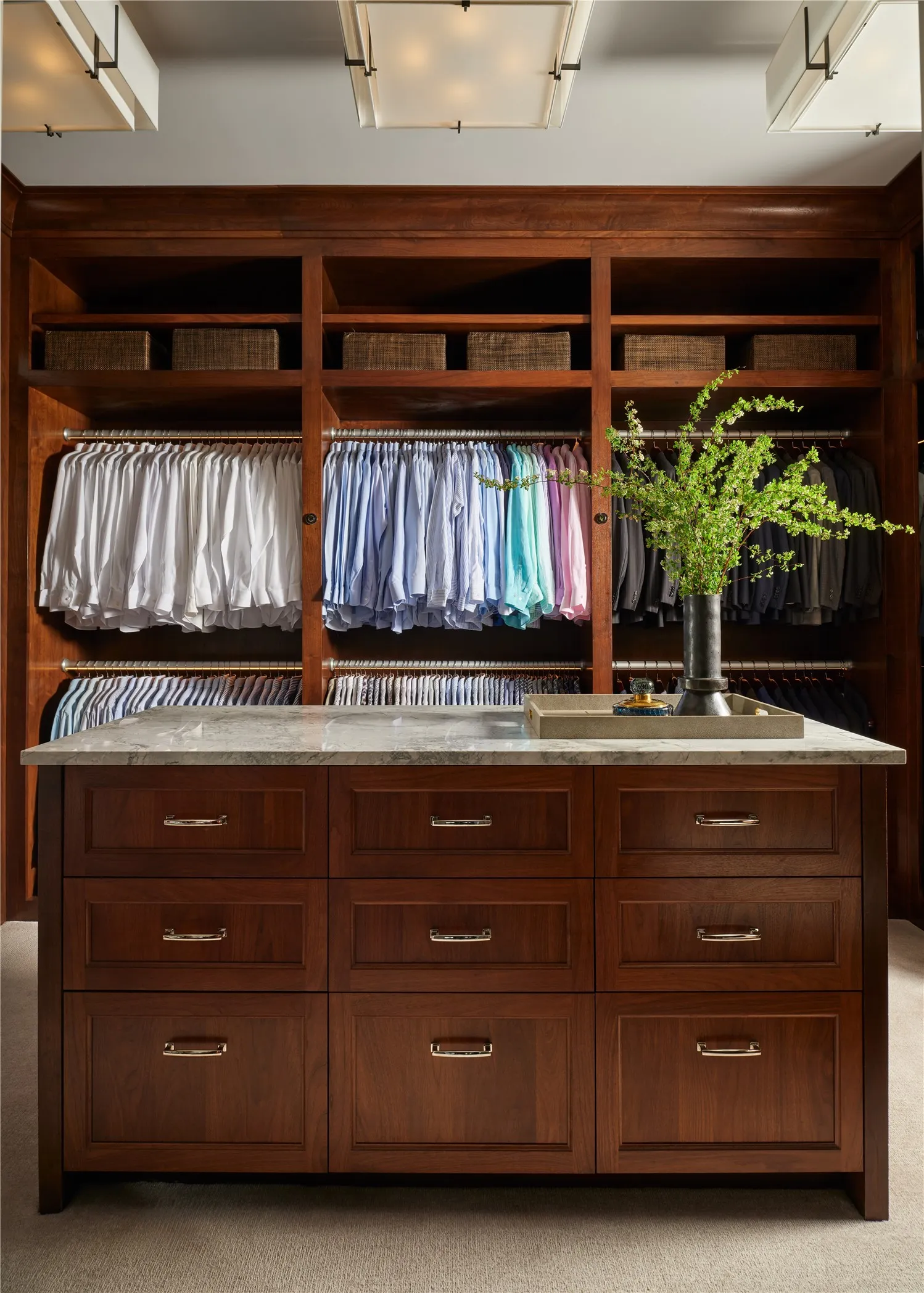 Primary closet 1- gorgeous built ins and abundant space