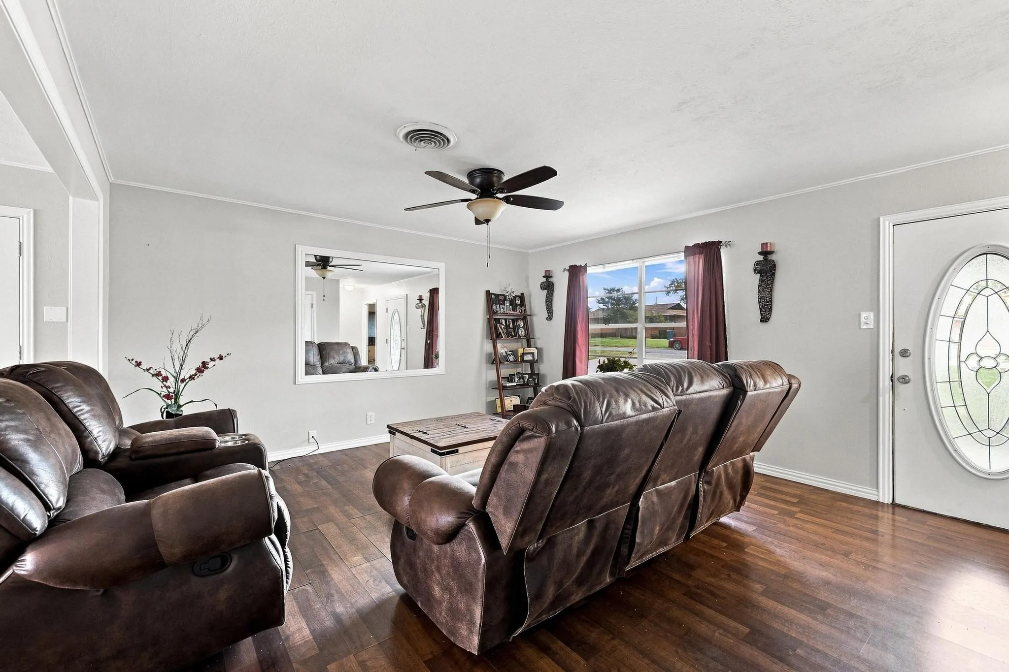 Wood-finish flooring throughout the space