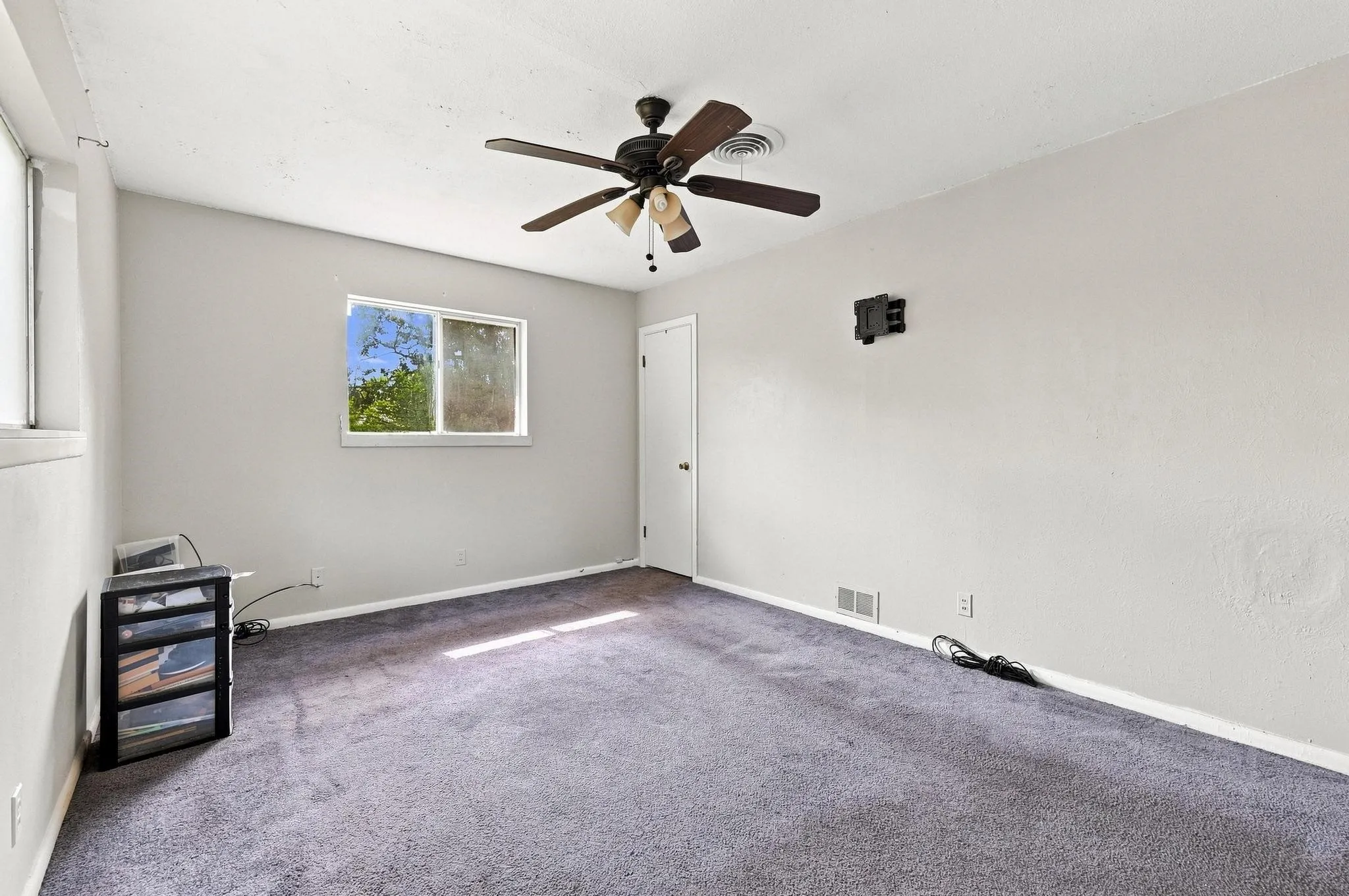 Recessed window, ceiling-mounted fan, and wall-mounted fixture