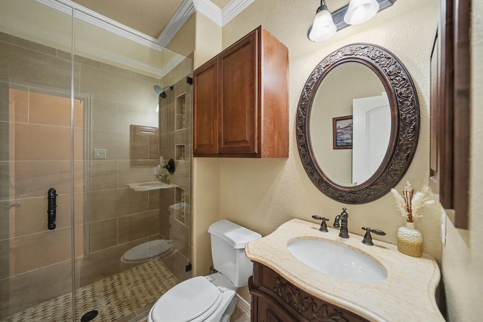 full bath off the laundry room, kitchen area, and garage entrance