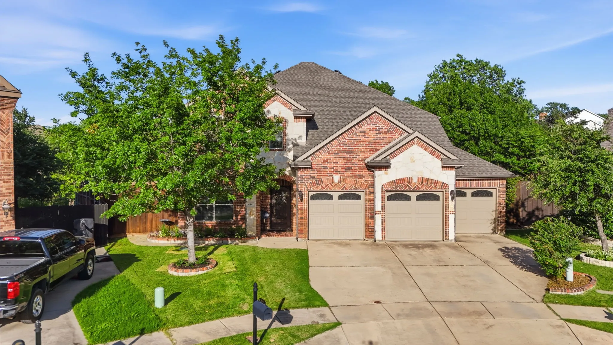 Home in a cul-de-sac, on a greenbelt, 3 car garage can also be a 4 car garage, shed in the back, and over the treeline a gorgeous lake