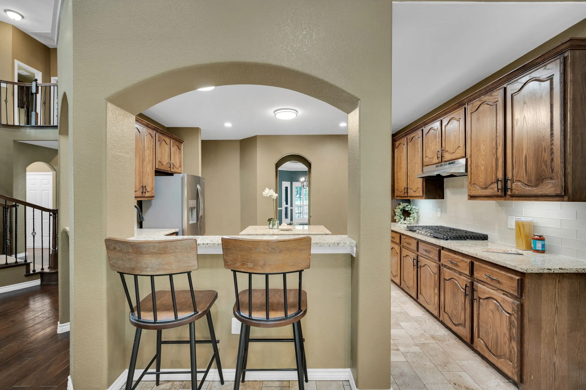 Eat-in kitchen area with a breakfast bar, perfect for casual dining.