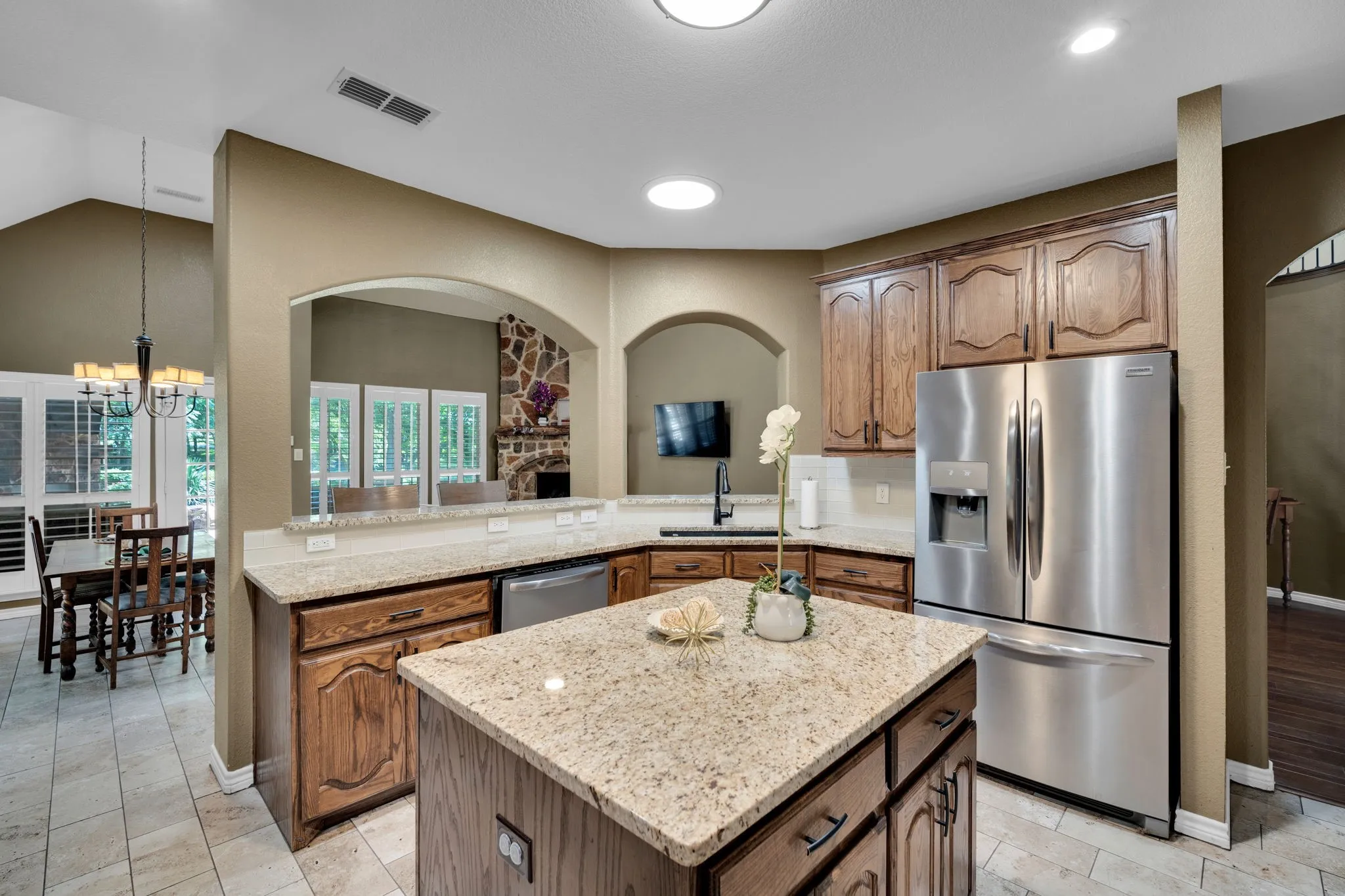 Chef's kitchen featuring a large island and abundant cabinetry, ideal for entertaining.