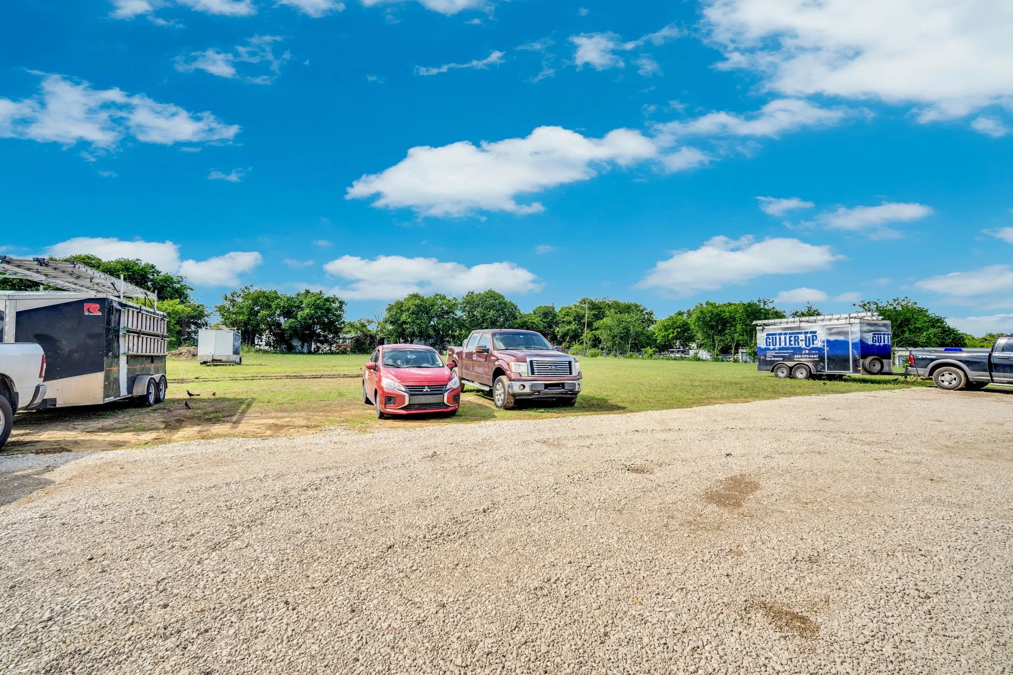 Generous rear parking and lot area providing ample room for equipment, trailers, or additional storage, a great added value for any operation.