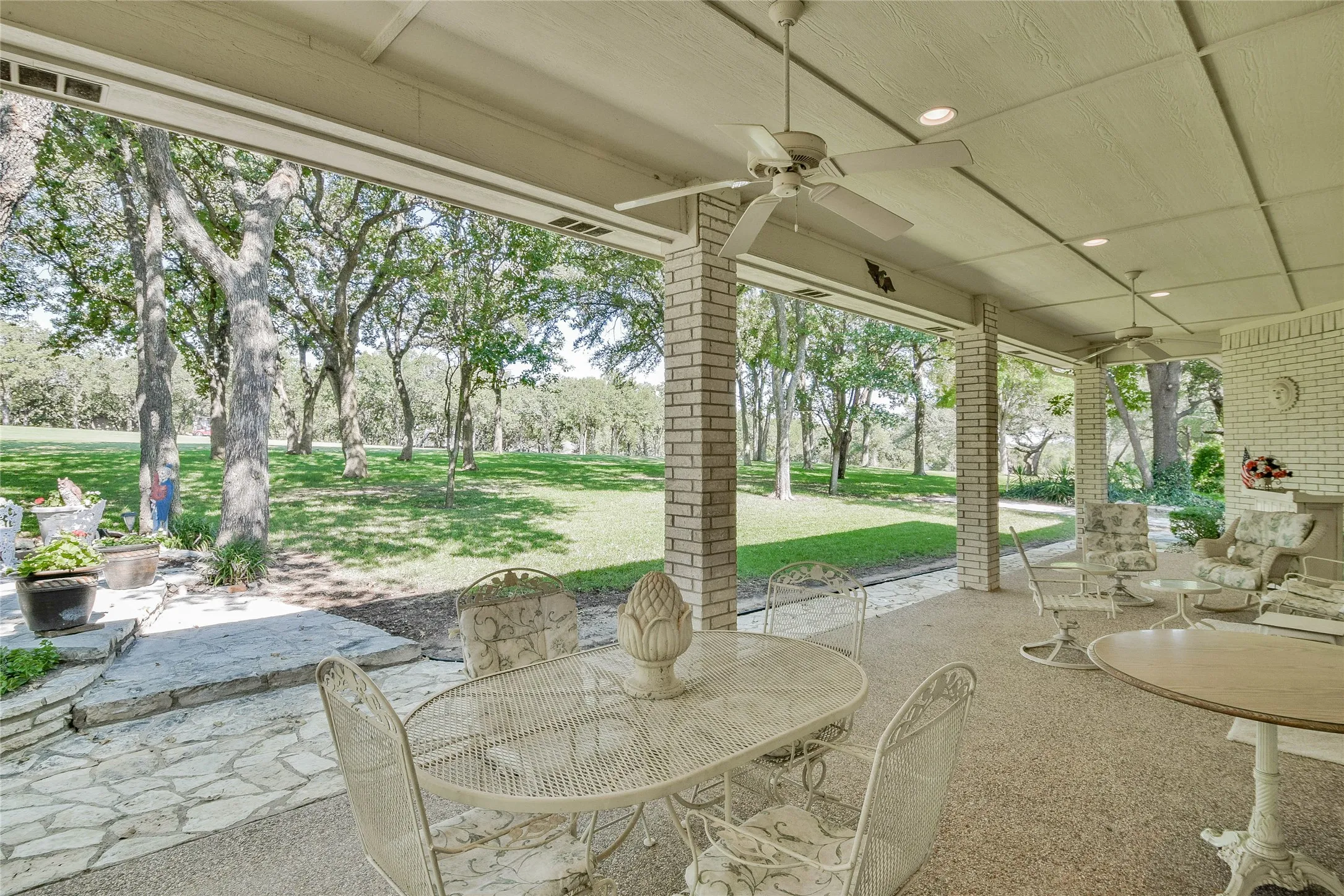 View of patio / terrace featuring a ceiling fan and outdoor dining space