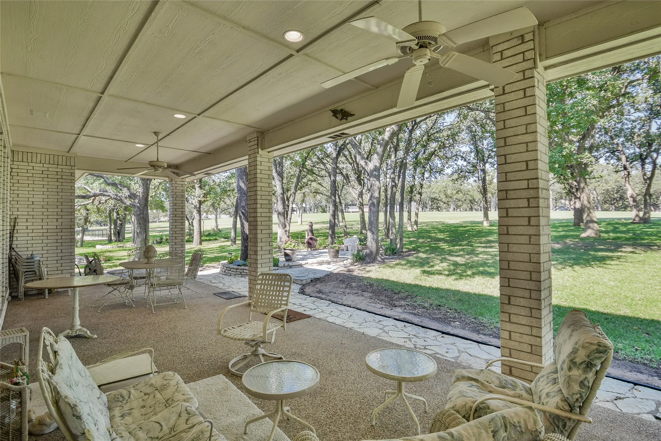 View of patio with a ceiling fan