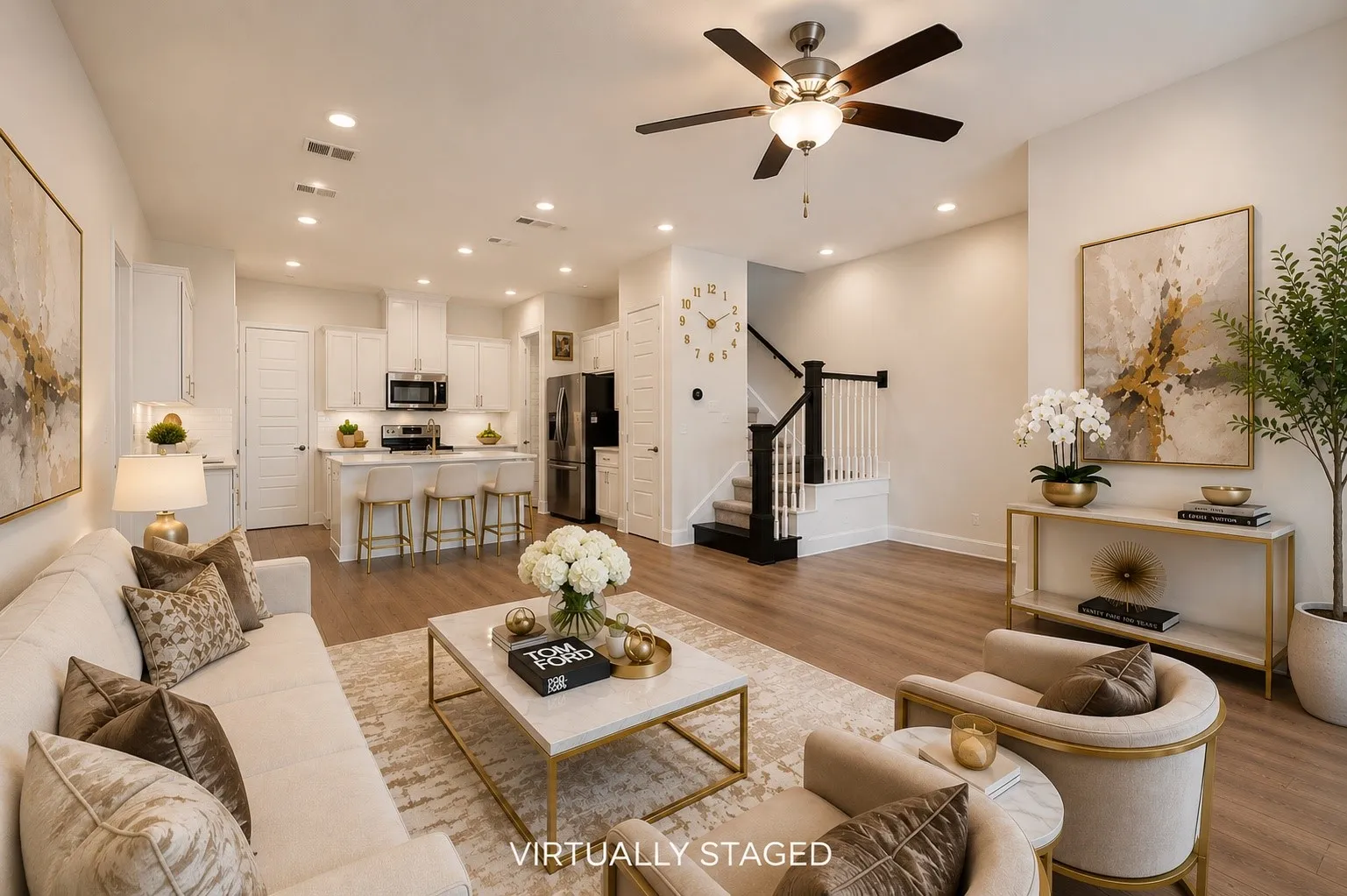 Open-concept living space featuring wood-finish flooring, recessed lighting, and a ceiling fan