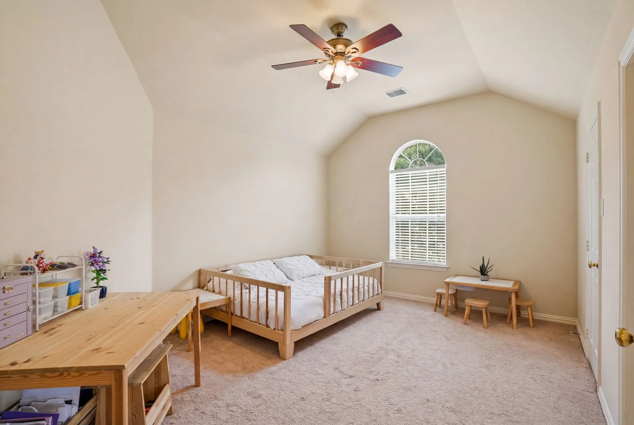 Bright, spacious, and filled with natural light, this upstairs bedroom offers comfort, privacy, and flexibility for family or overnight guests.