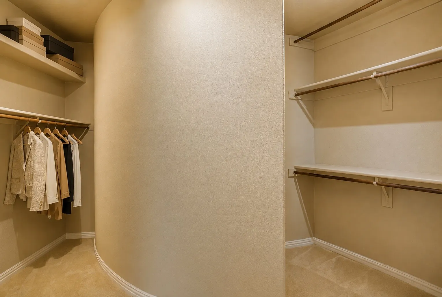 A spacious primary walk-in closet with built-in organization provides room for every season while keeping everything neatly within reach.