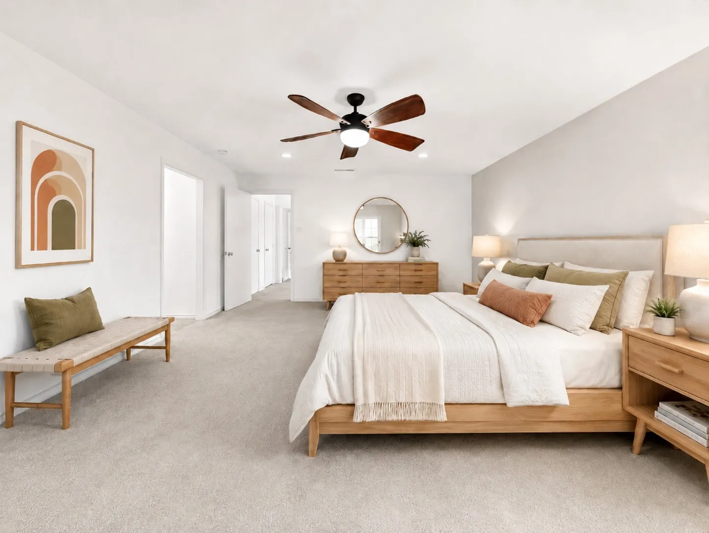 Spacious Bedroom  featuring a ceiling fan with light fixture, contemporary light-colored walls,the bedroom is Virtually staged