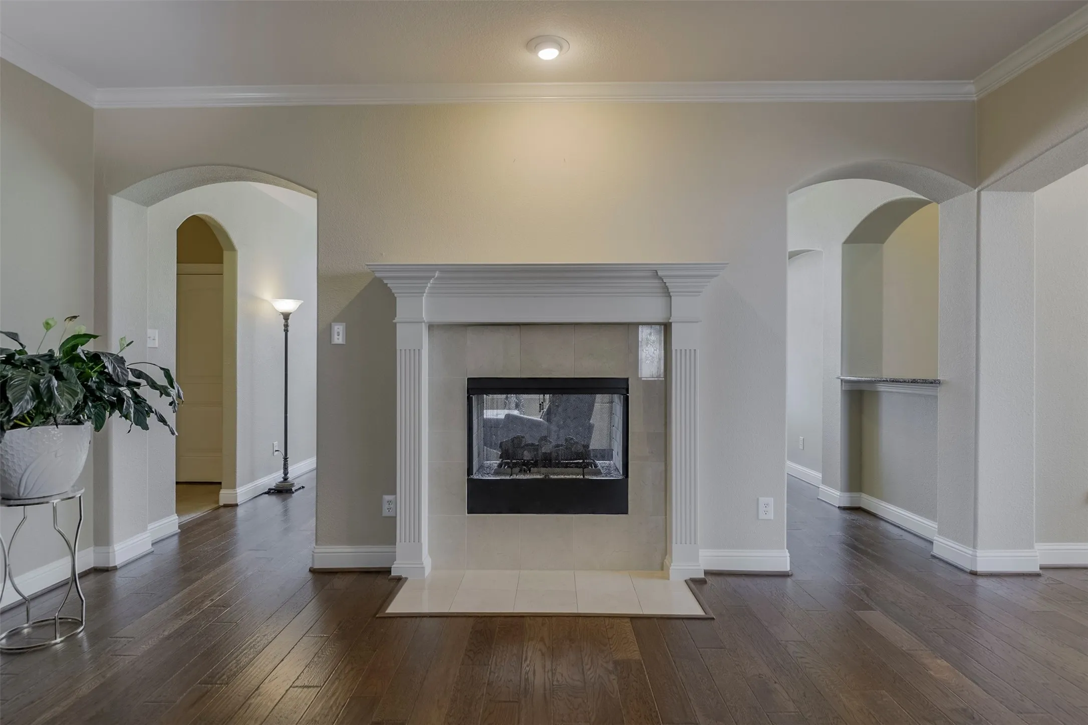 Formal Dining Room w 2 sided Fireplace into Family Room