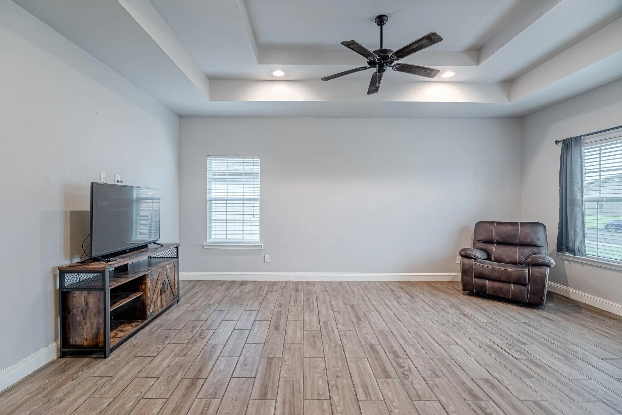 Notice the Tray Celing and the ceiling fan.  Furniture has been removed from house.
