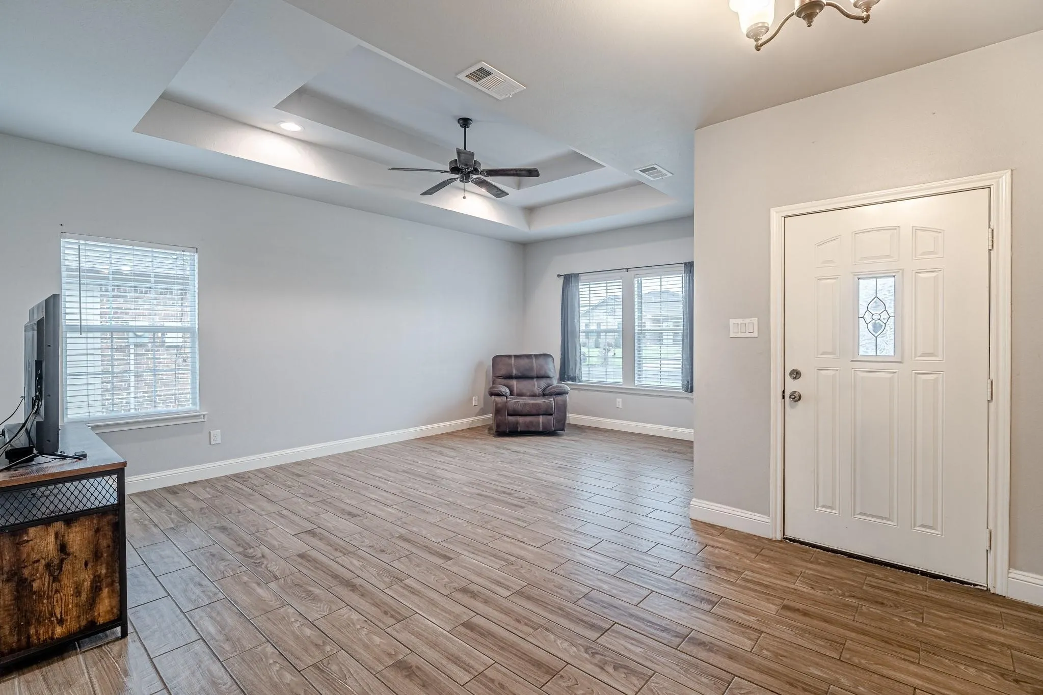 Front Entry and Living room are a part of the open floor plan.