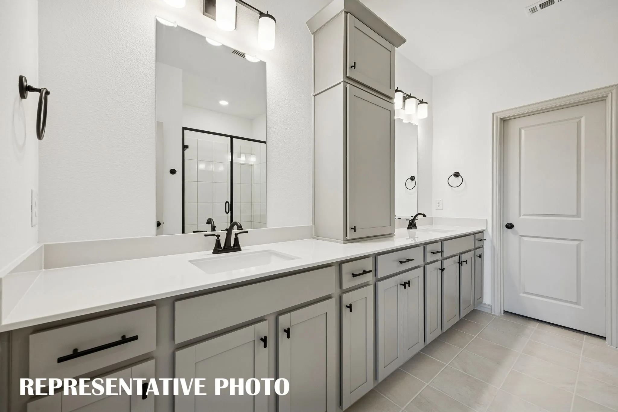 No shortage of space or style in this dream owner's bath!  REPRESENTATIVE PHOTO