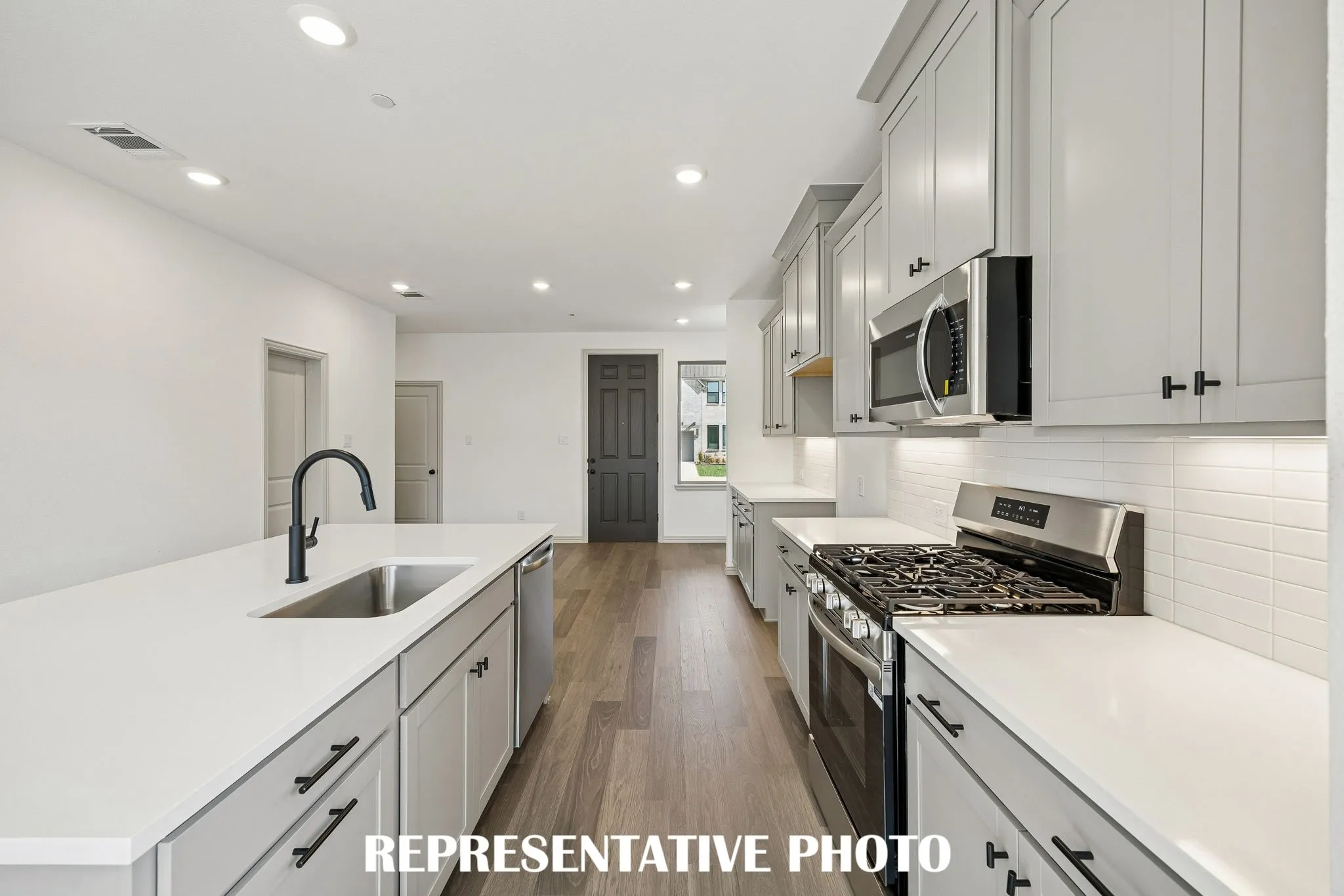 Gorgeous design elements are everywhere you look in this chef's kitchen!  REPRESENTATIVE PHOTO
