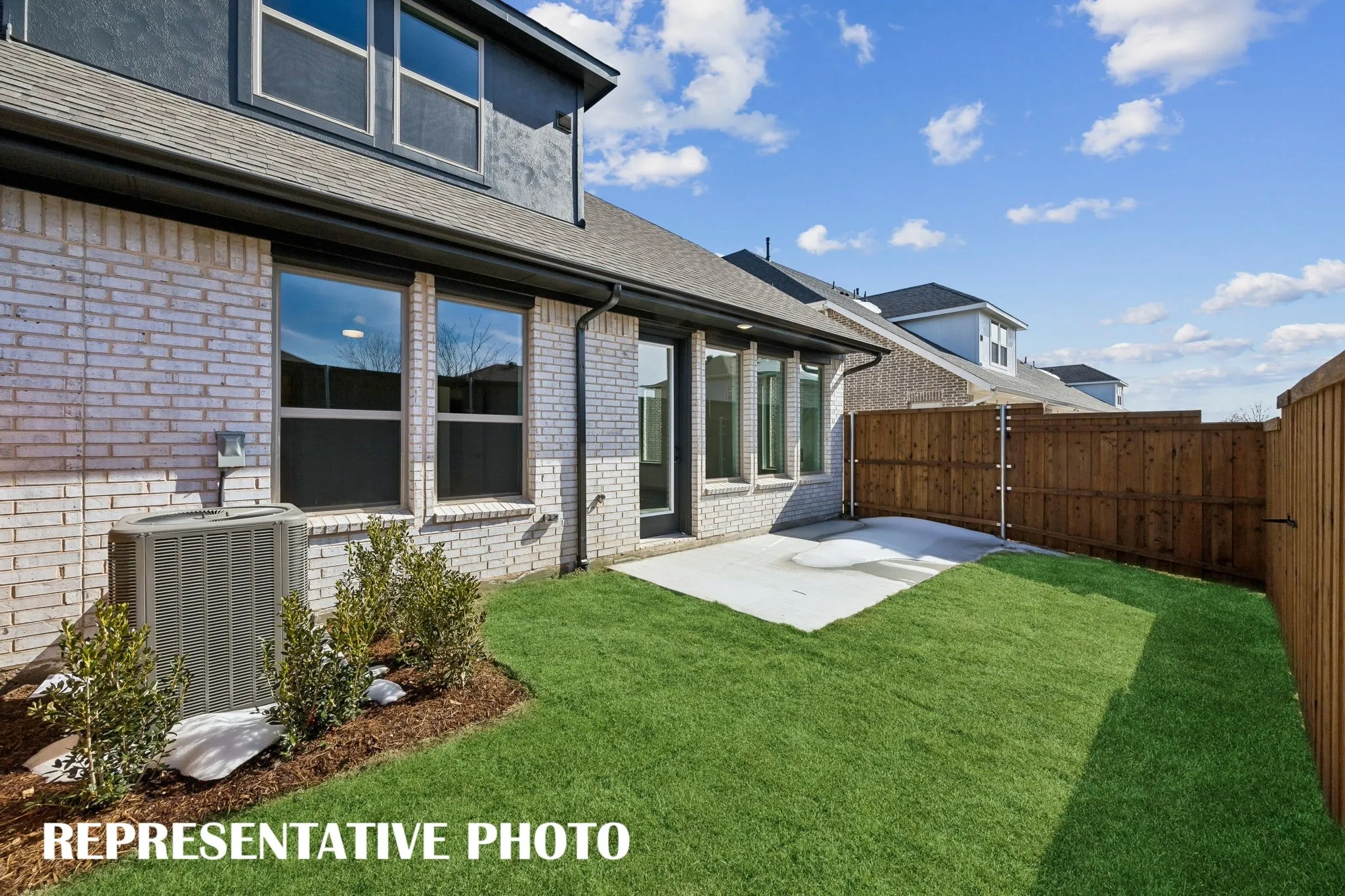 Our Walker floor plan offers a private fenced back yard where you can enjoy the great outdoors!  REPRESENTATIVE PHOTO